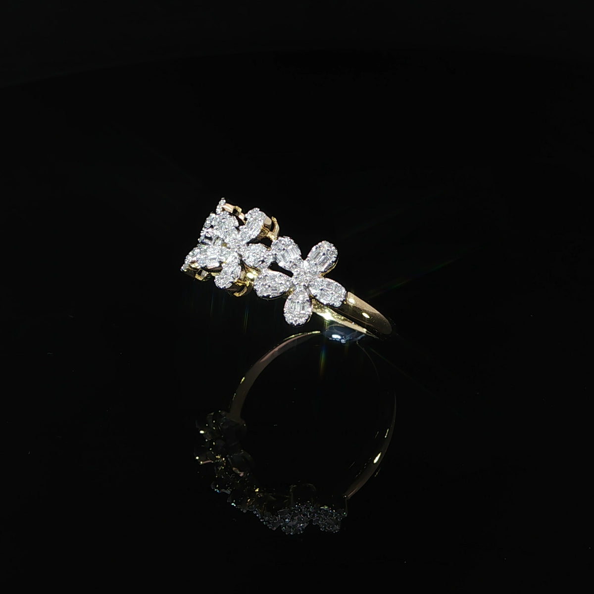 Floral diamond ring showing baguette petal side angle profile