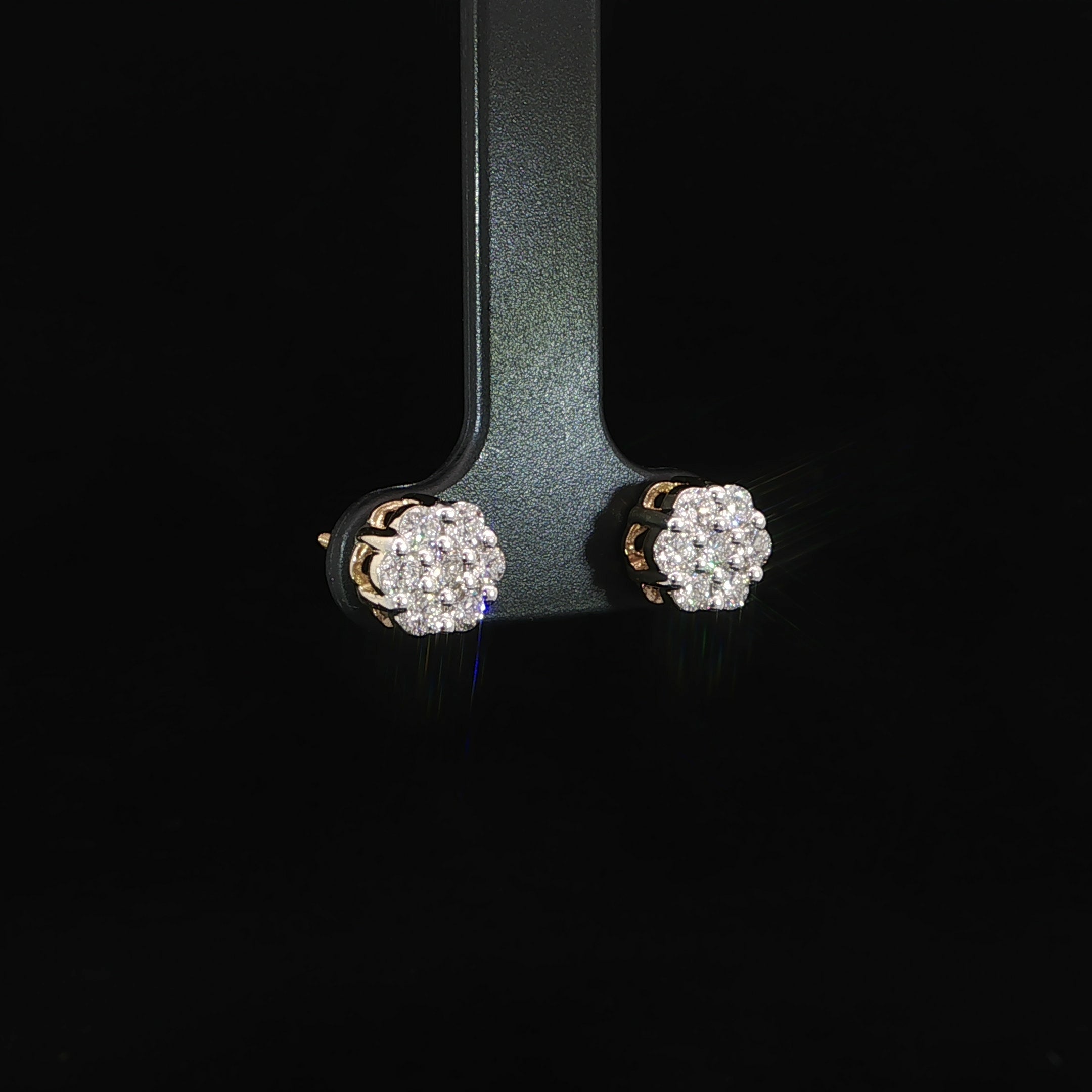 Angled view of yellow gold lab-grown diamond cluster studs
