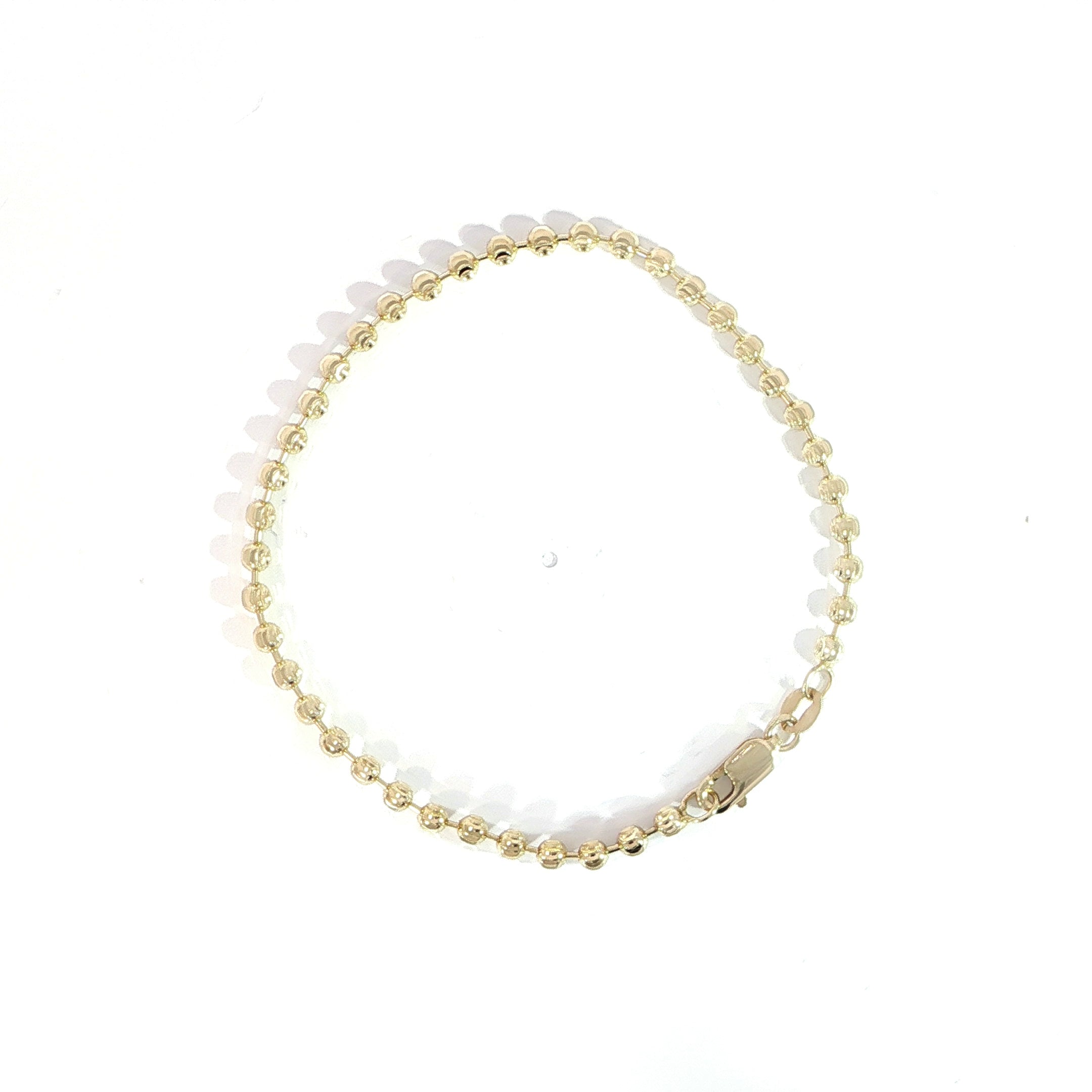 14K yellow gold bracelet featuring 3MM diamond cut beads