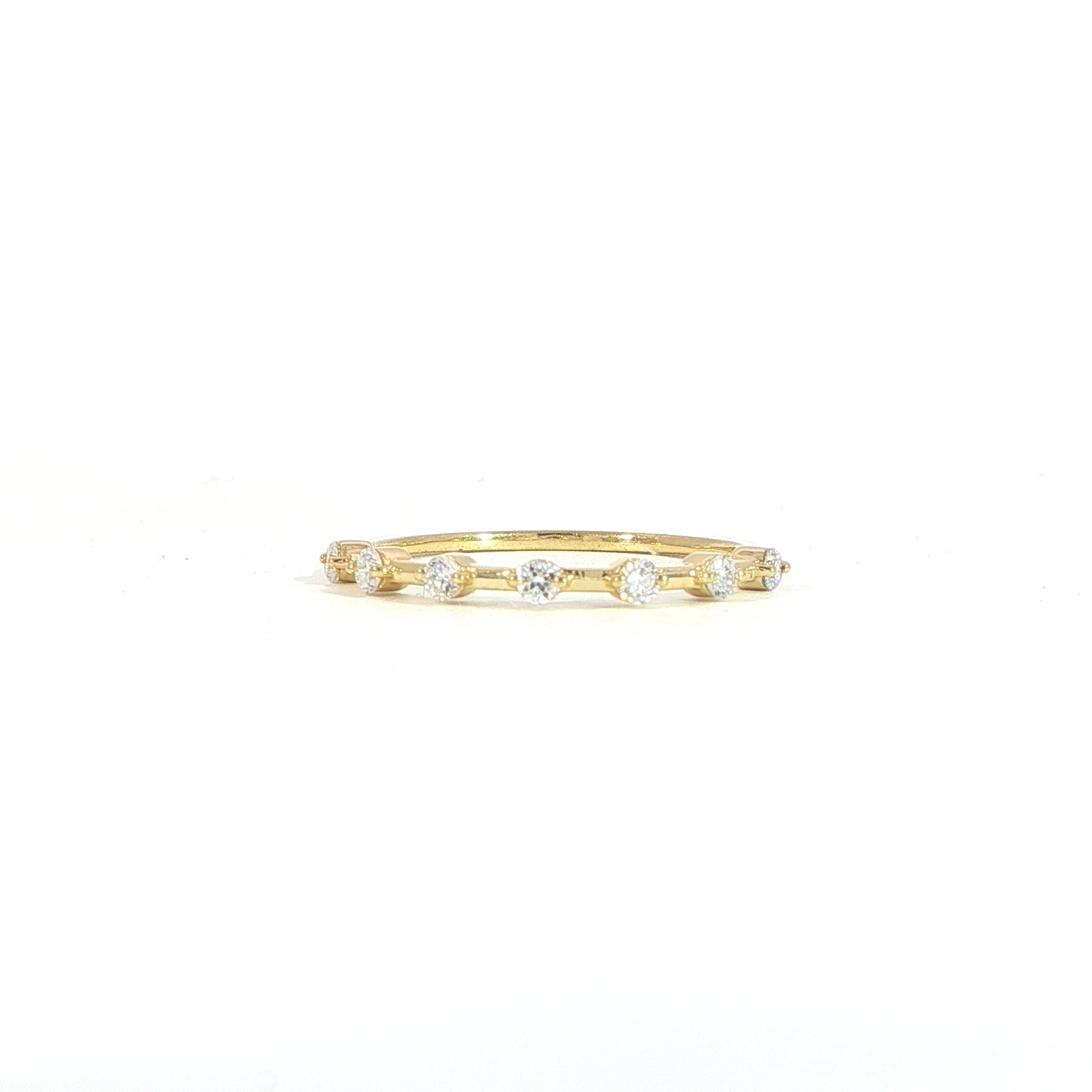 14K gold diamond station band with 0.20 CTW lab grown diamonds in bezel setting