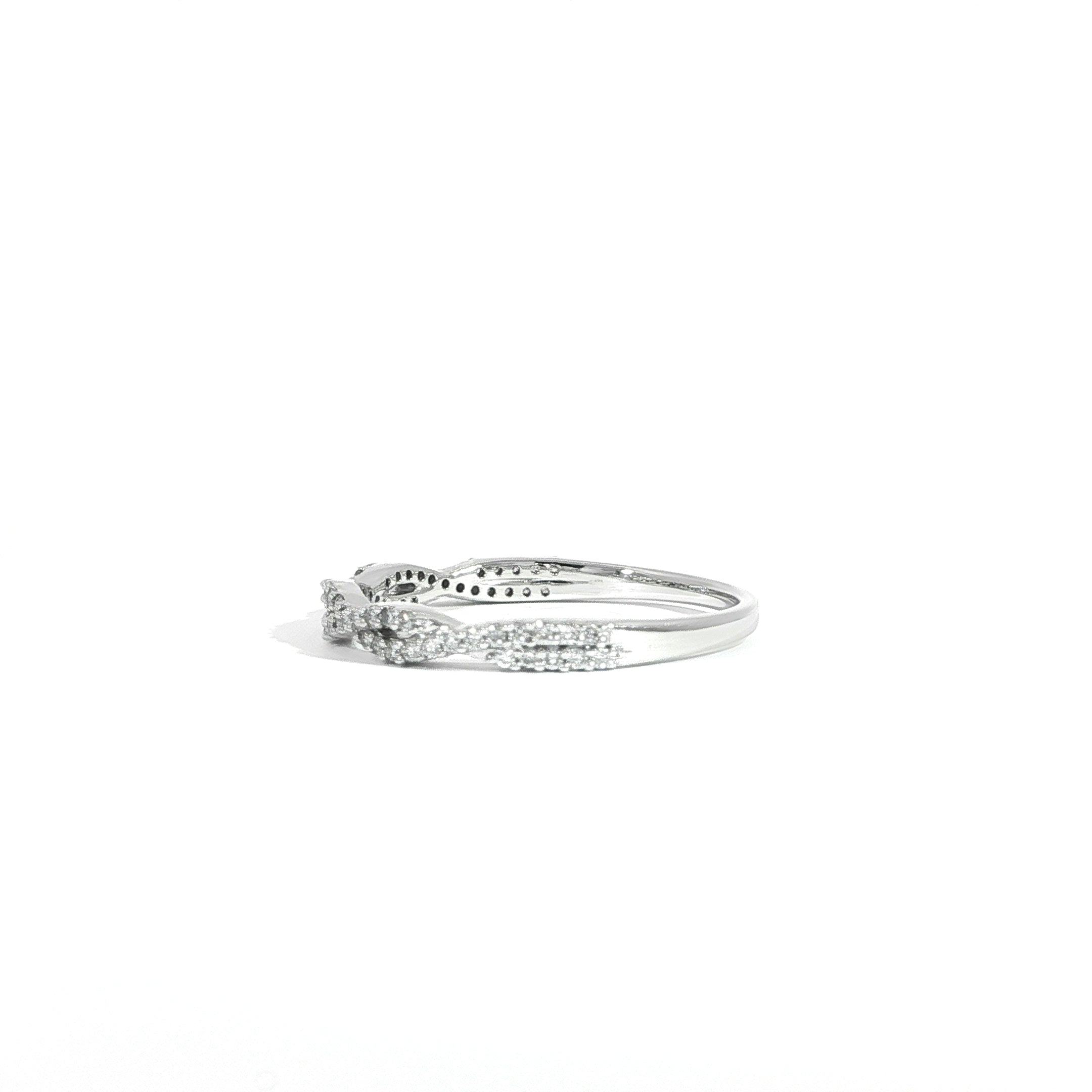 Side view of 14K gold stackable wedding band with twist and 0.23 carat lab diamonds