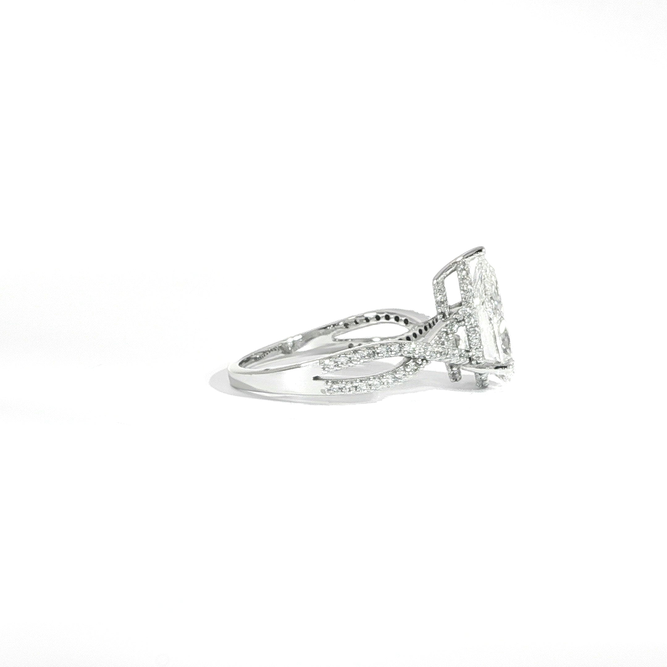 14K white gold pear diamond ring with twist band and hidden halo setting