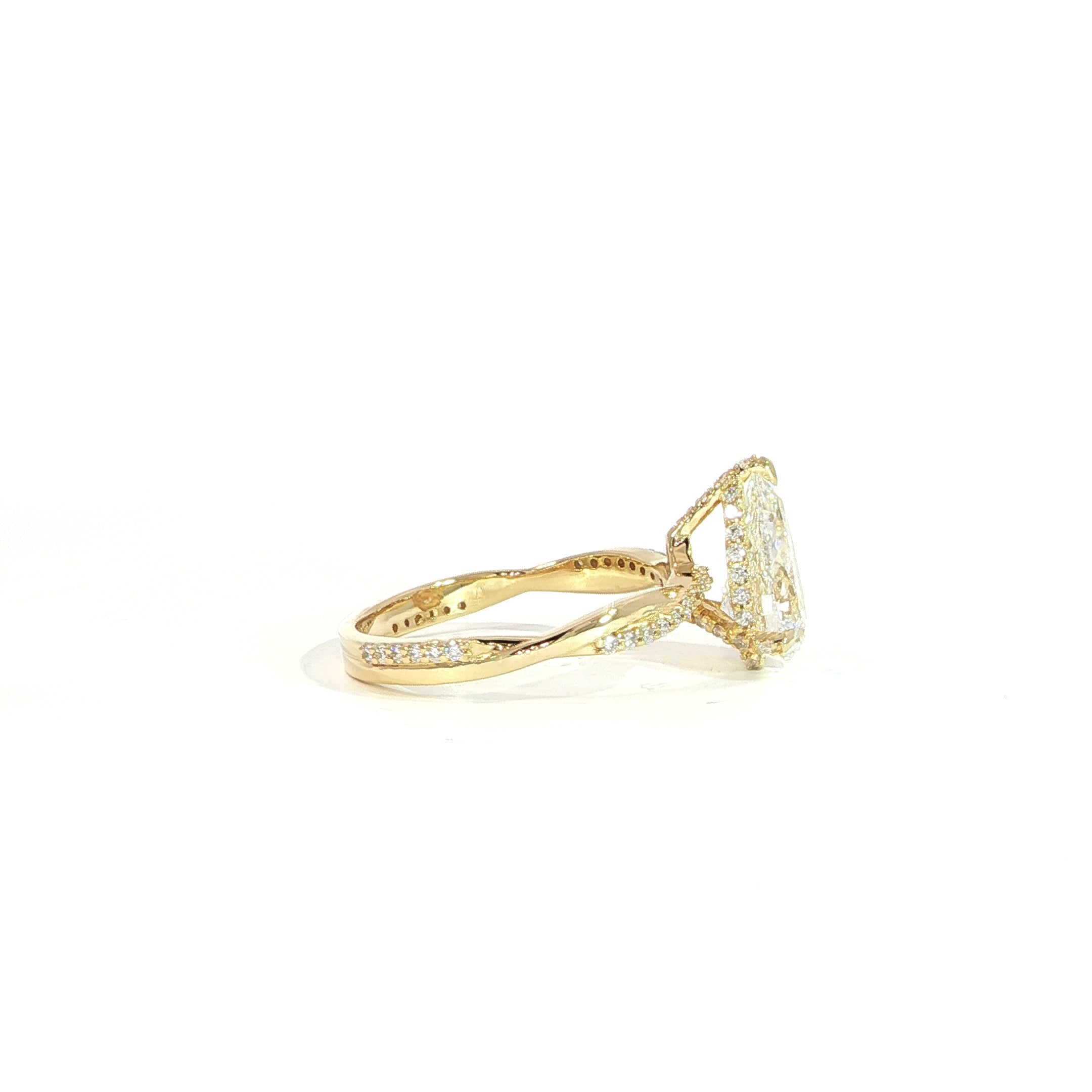 Elegant pear lab diamond ring with flowing twist band design