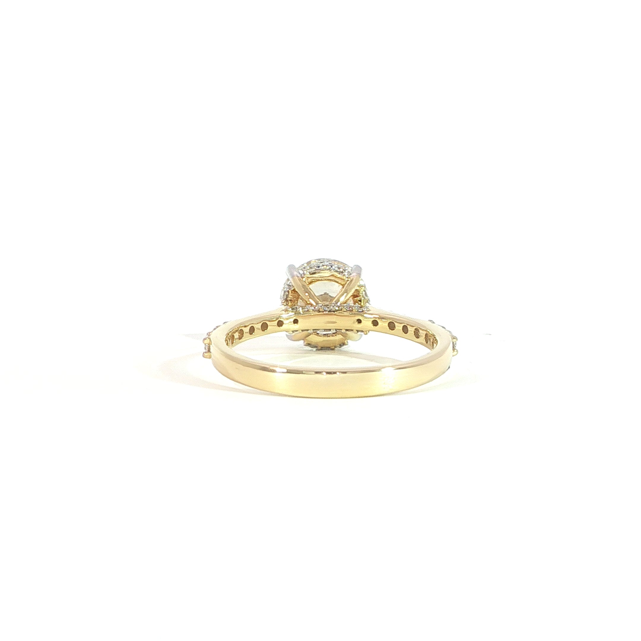 Back view of round diamond engagement ring with diamond band and hidden halo
