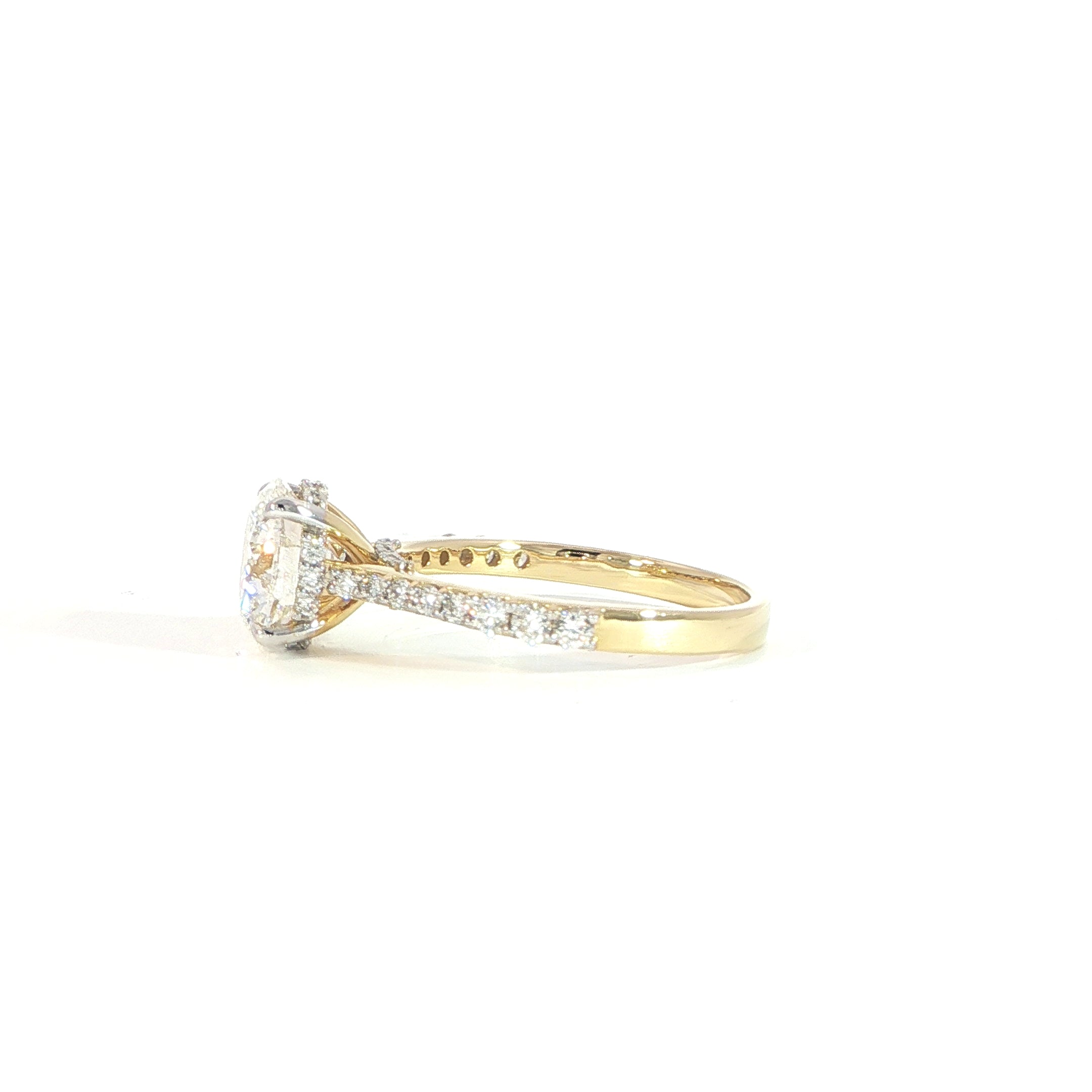 Side view of 14K gold cathedral diamond ring with hidden halo detail