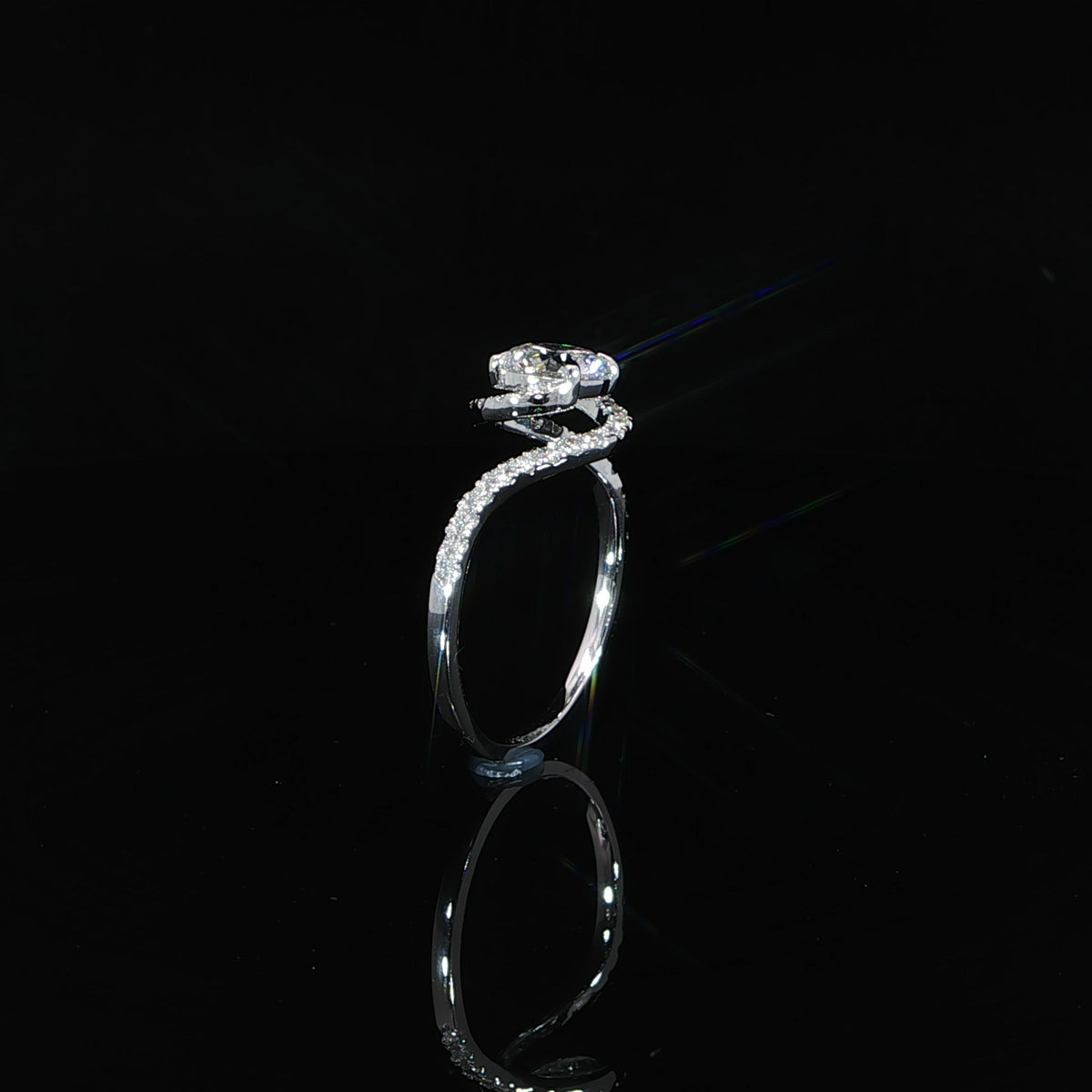 Side detail of 14K white gold 1 carat diamond bypass engagement ring