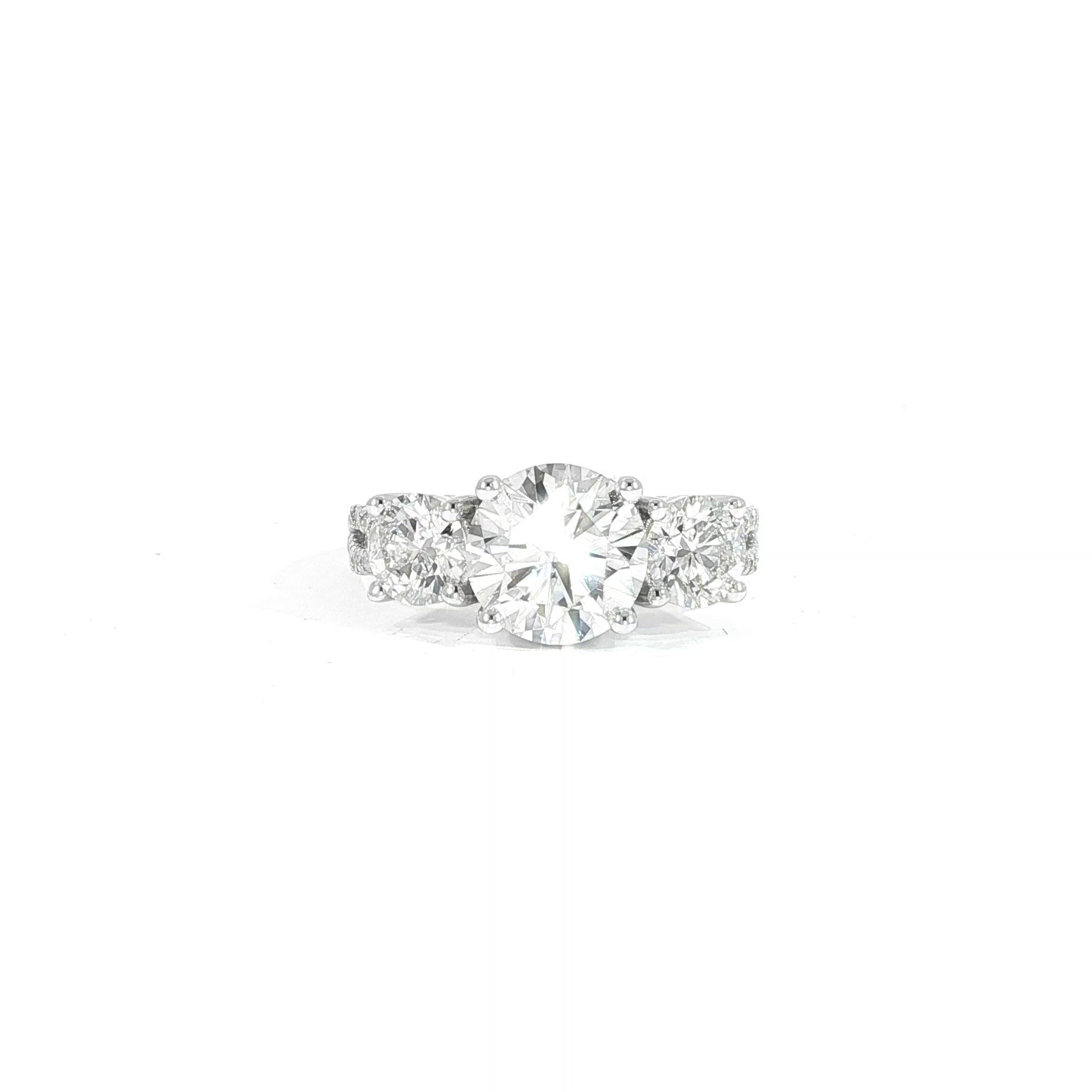 14K white gold three-stone round lab diamond ring with 2 CT center and split shank design