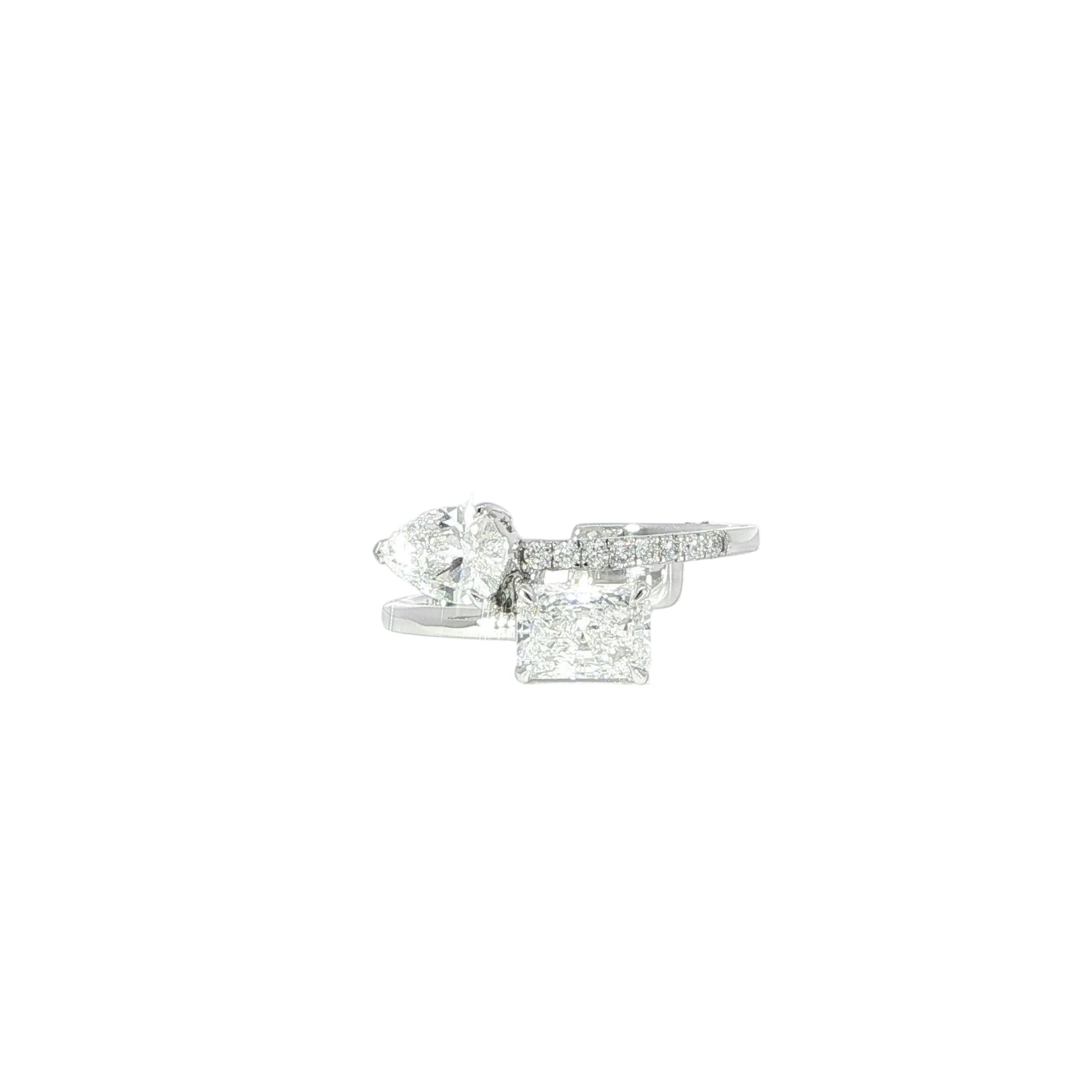 14K white gold Toi et Moi ring with radiant and pear-shaped diamonds