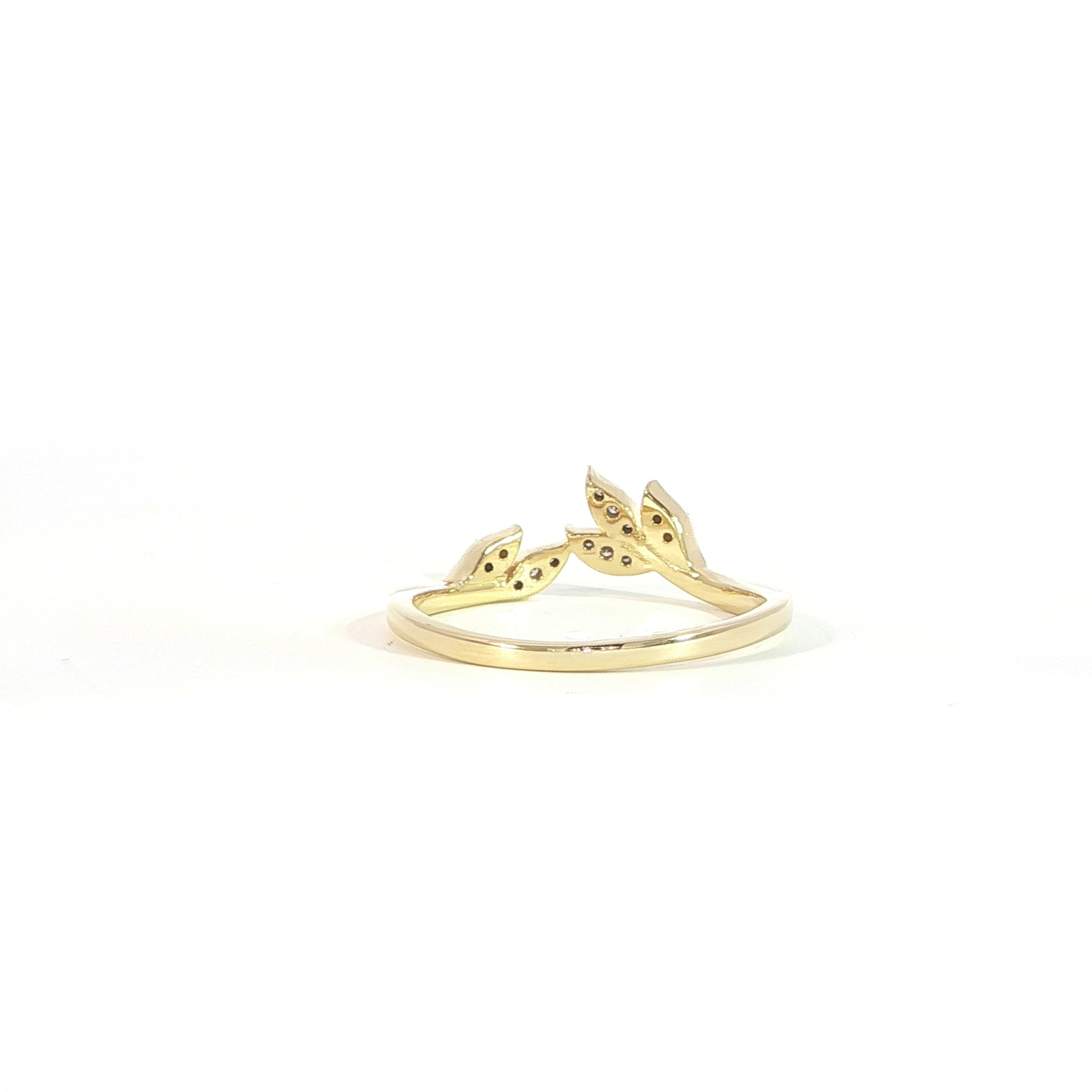 Back view of yellow gold diamond stacking band with a nature-inspired design