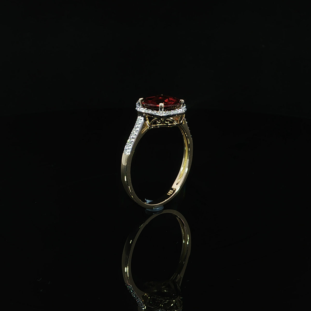 14K yellow gold ring with an 8 mm red garnet and 0.10 CTW natural diamonds.