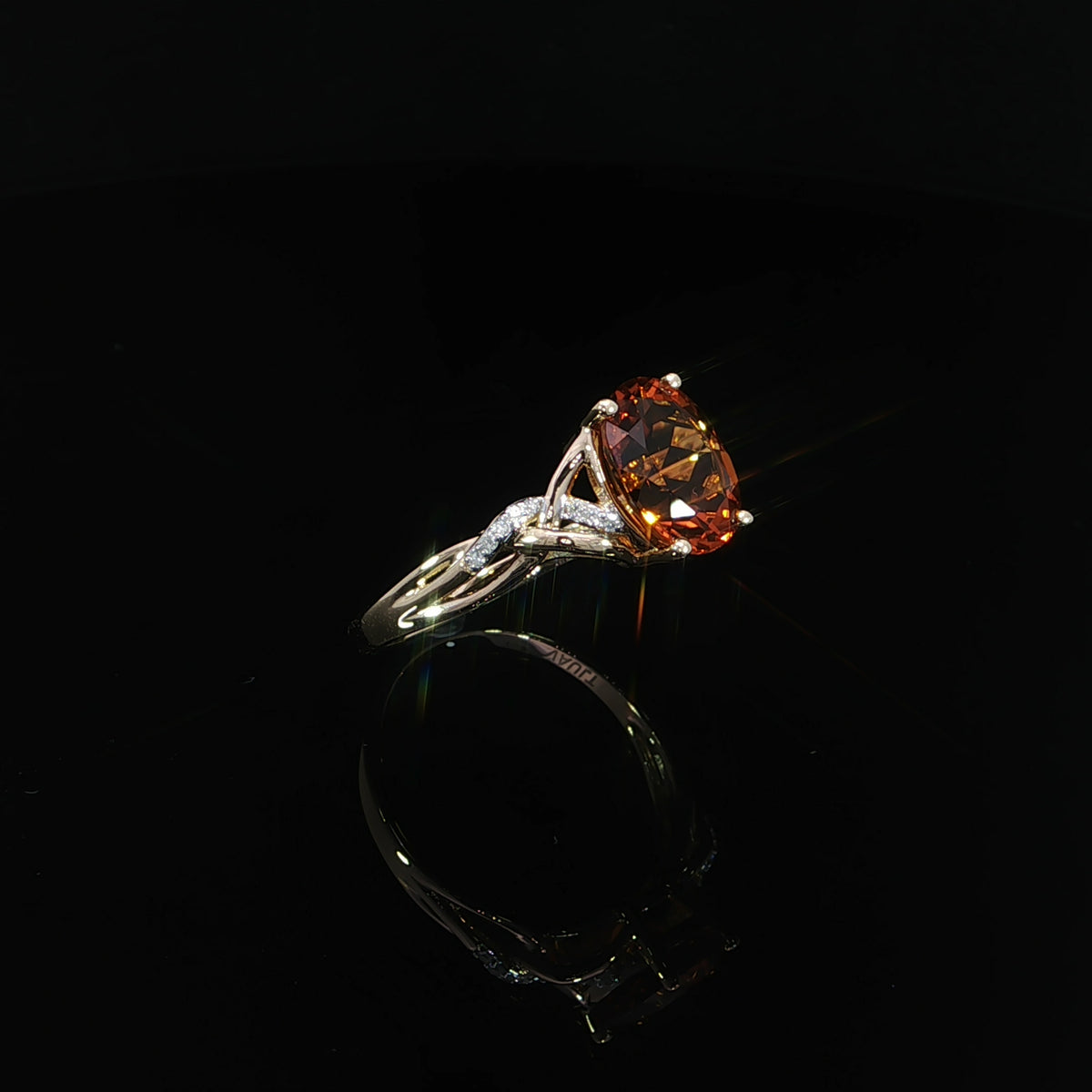 Angled view of a 10x8 mm natural citrine ring in 14K yellow gold with 0.06 CTW natural diamonds.