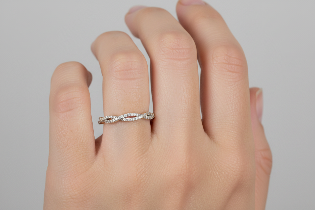 14K gold twist diamond band with lab-grown diamonds on model hand