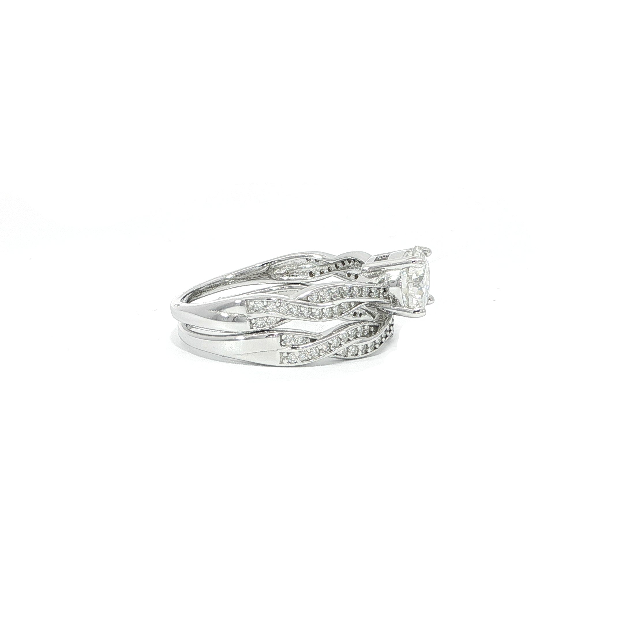 Sterling silver moissanite engagement ring with matching twisted wedding band