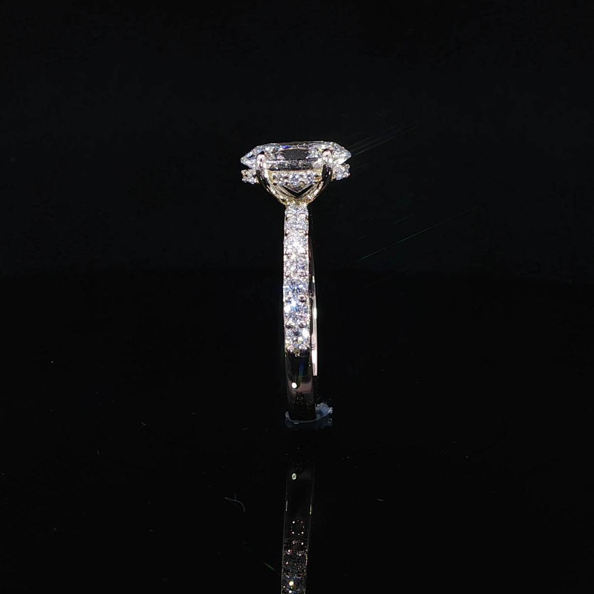 2.04-carat oval lab-grown diamond engagement ring with a hidden halo in 14K yellow gold.
