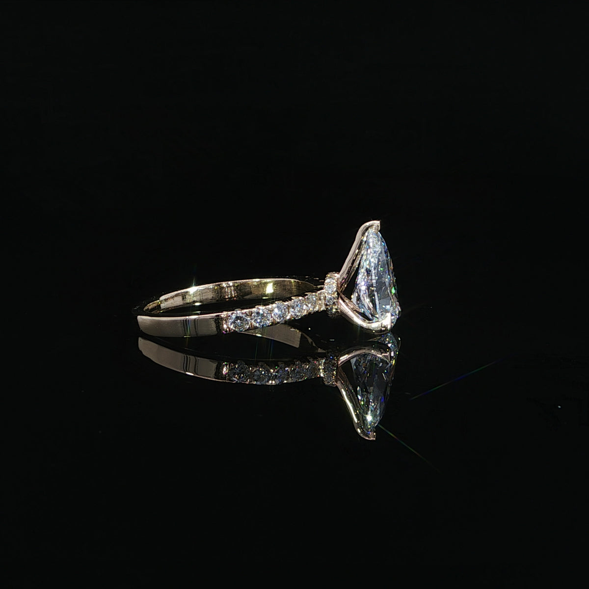 2.06-carat pear-shaped lab-grown diamond engagement ring crafted in 14K yellow gold.