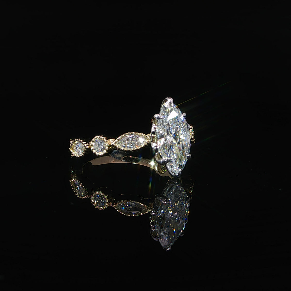 Marquise diamond engagement ring in 14K yellow gold with 2.20 carats total diamond weight