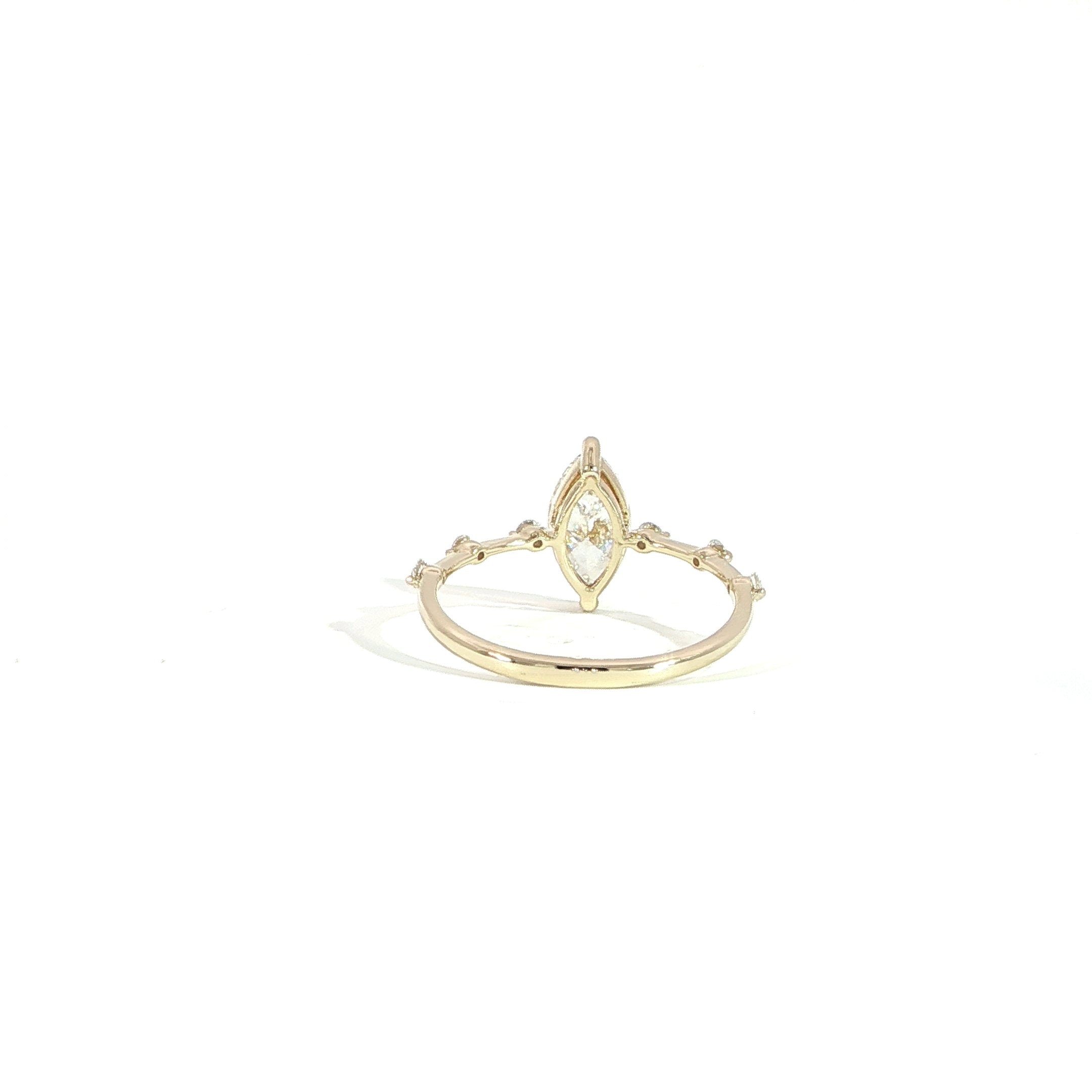 Back of marquise engagement ring with modern band design