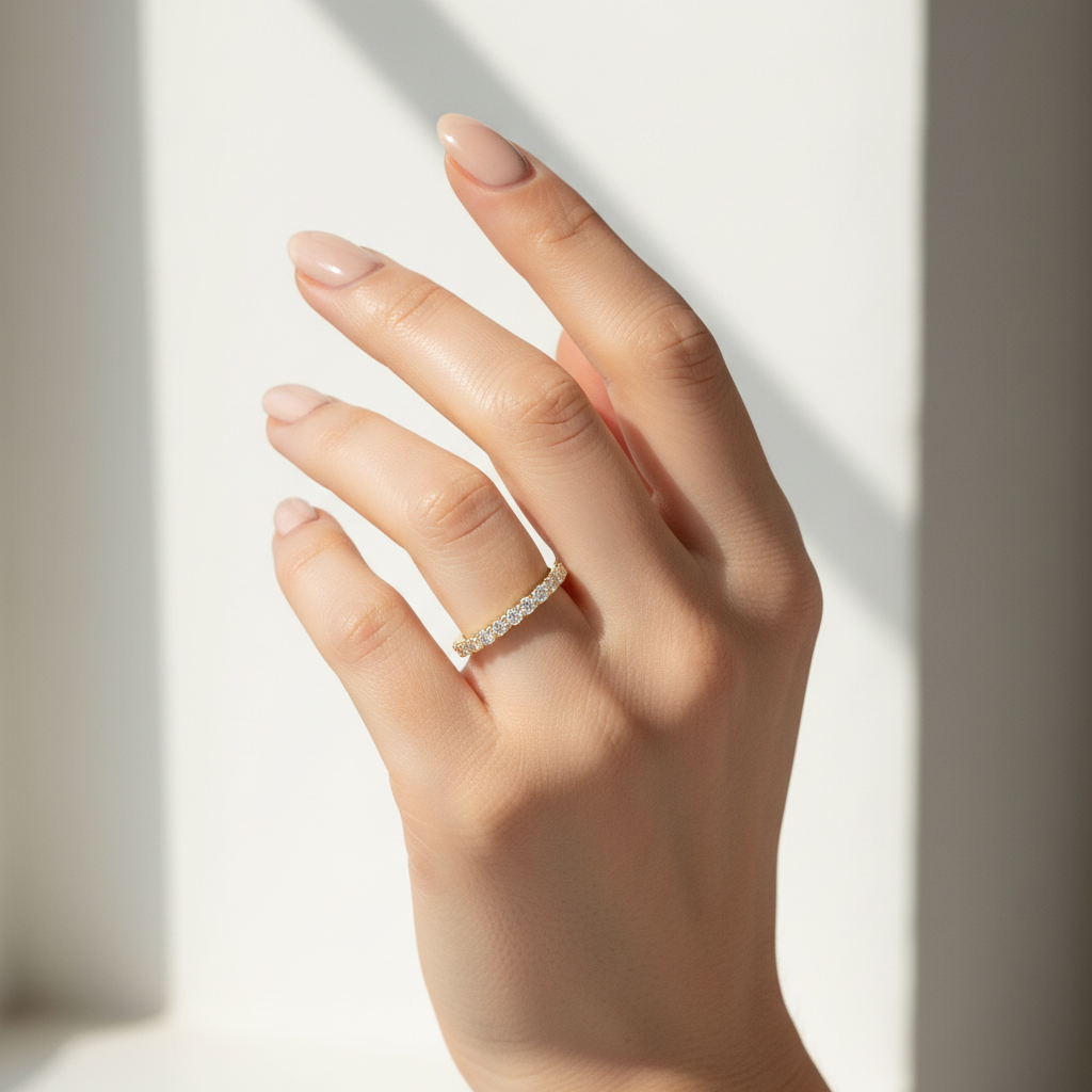 Model wearing rose gold lab-grown diamond band