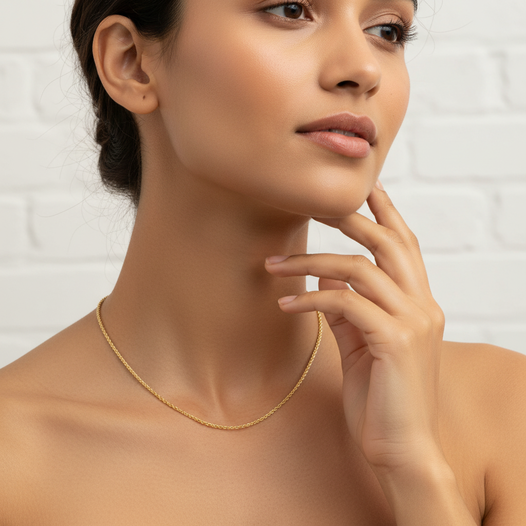 Model wearing solid 14K yellow gold rope chain with diamond-cut finish