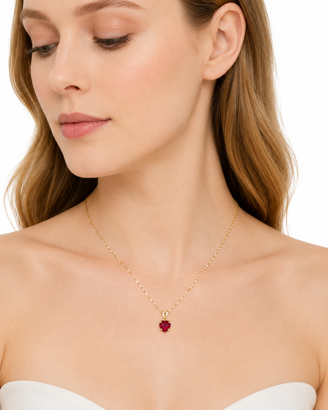 Model Wearing Delicate 14K Yellow Gold Necklace With Heart-Shaped Lab Ruby