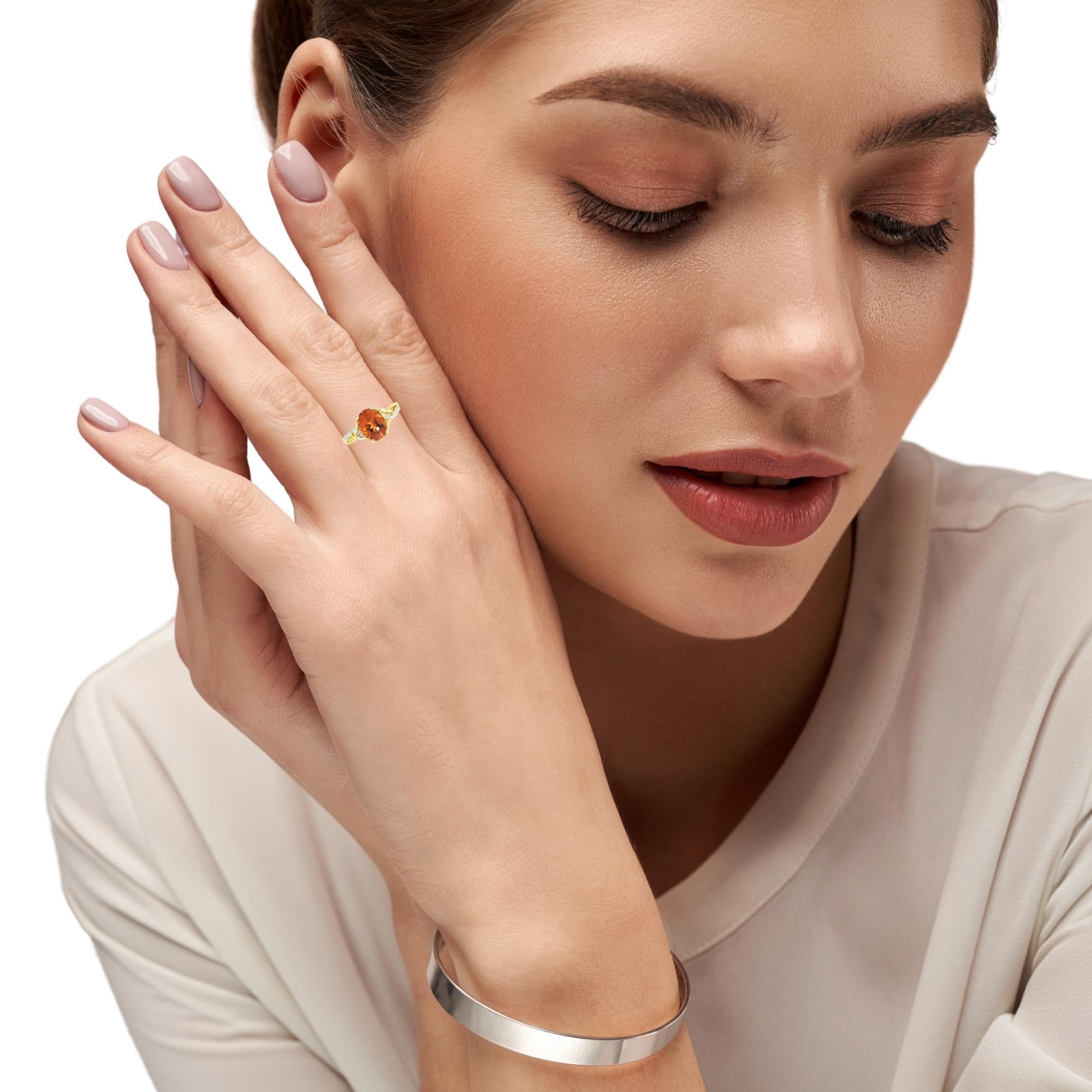Model wearing natural citrine yellow gold ring