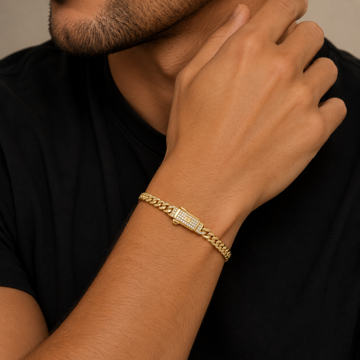 Cuban link bracelet featuring a secure CZ-accented clasp