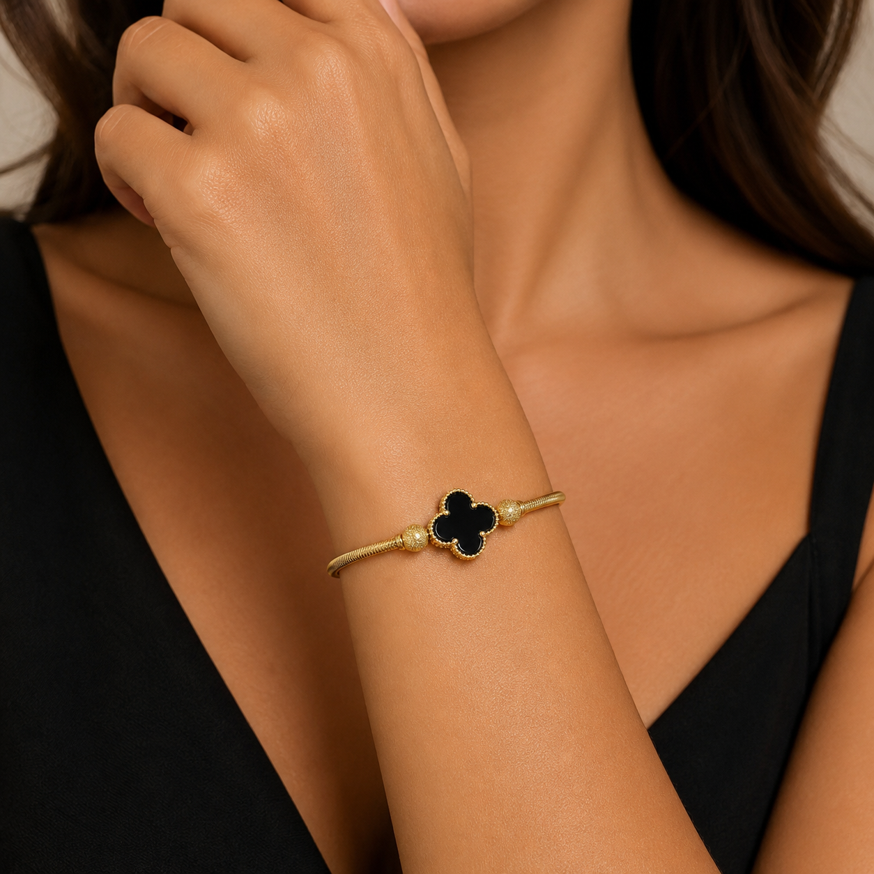 14K gold black onyx clover charm stretch bracelet