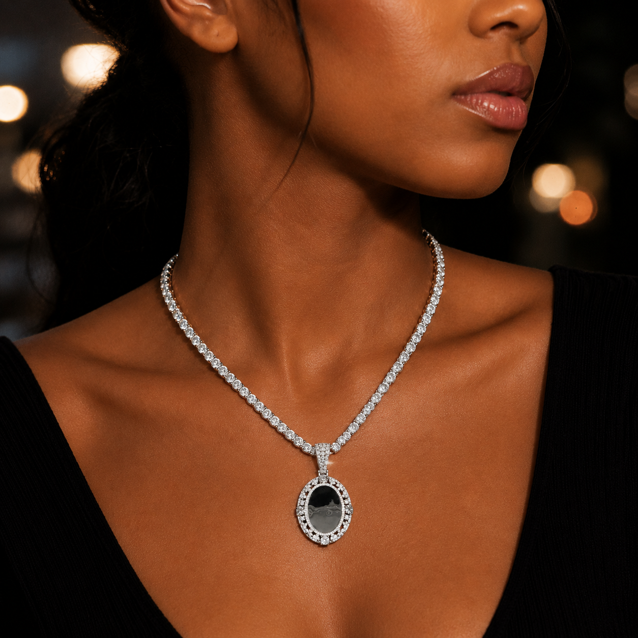 Model wearing oval shaped picture frame with VVS moissanites