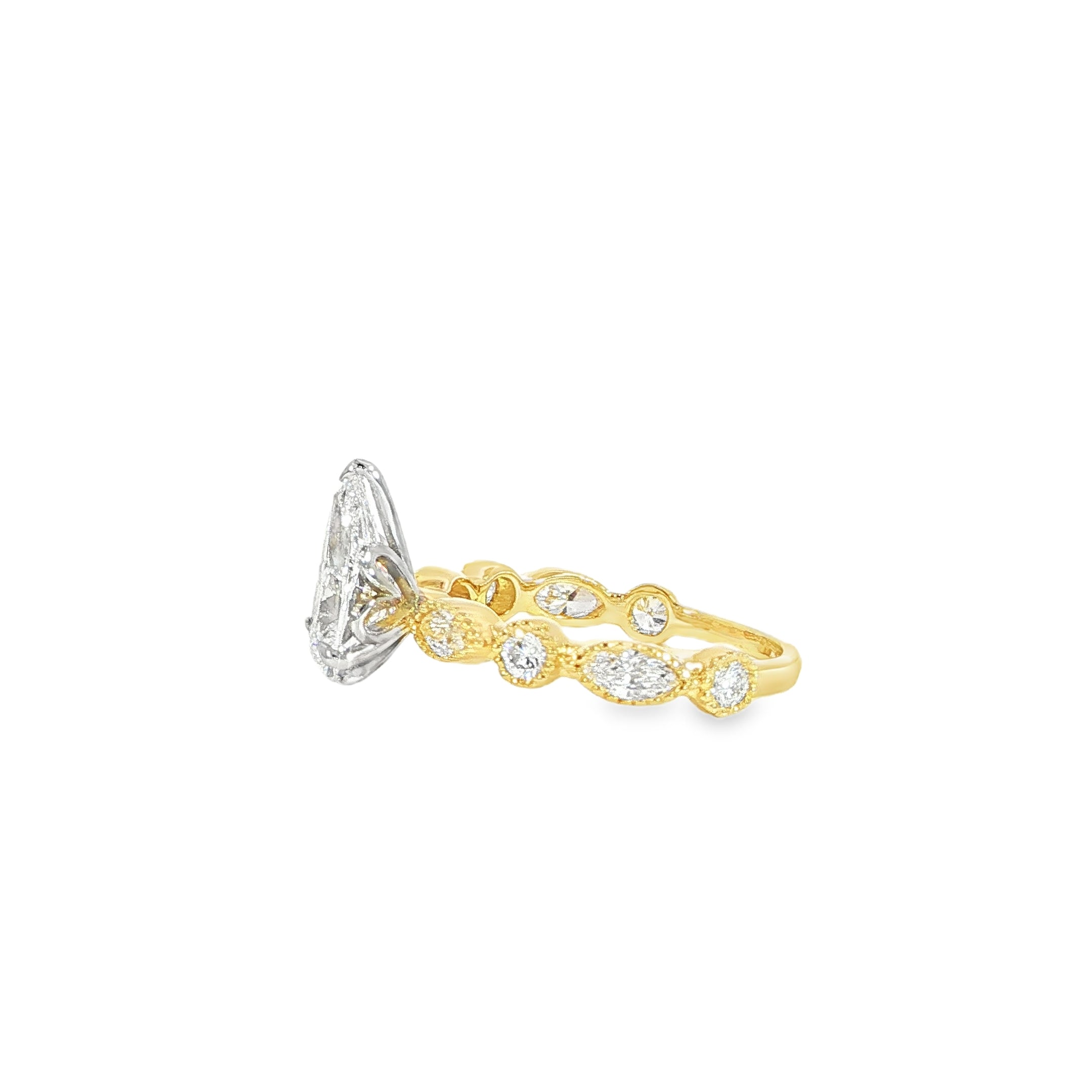 Side milgrain bezel diamond band detail pear diamond