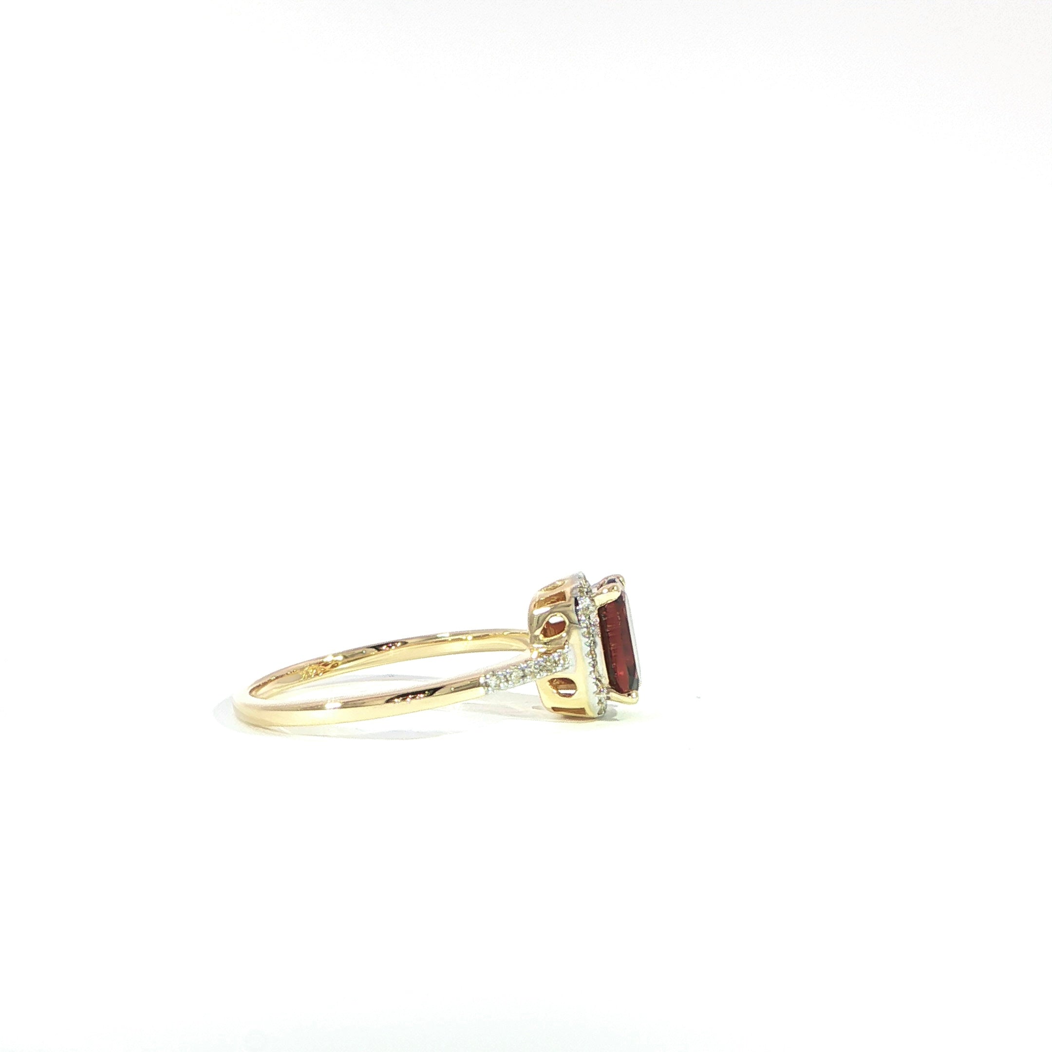 Side profile garnet cushion halo ring gold
