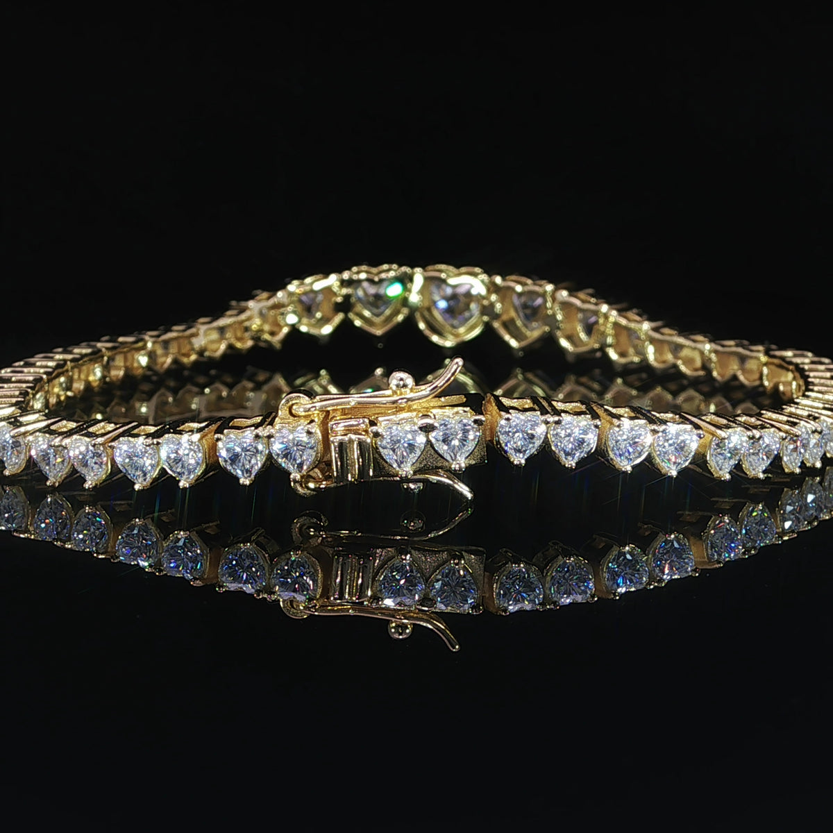 Heart moissanite tennis bracelet graduating from 8.5 mm to 4 mm clasp view
