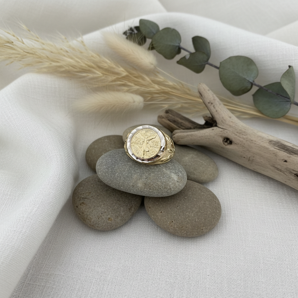 Yellow gold signet ring with coin-inspired design