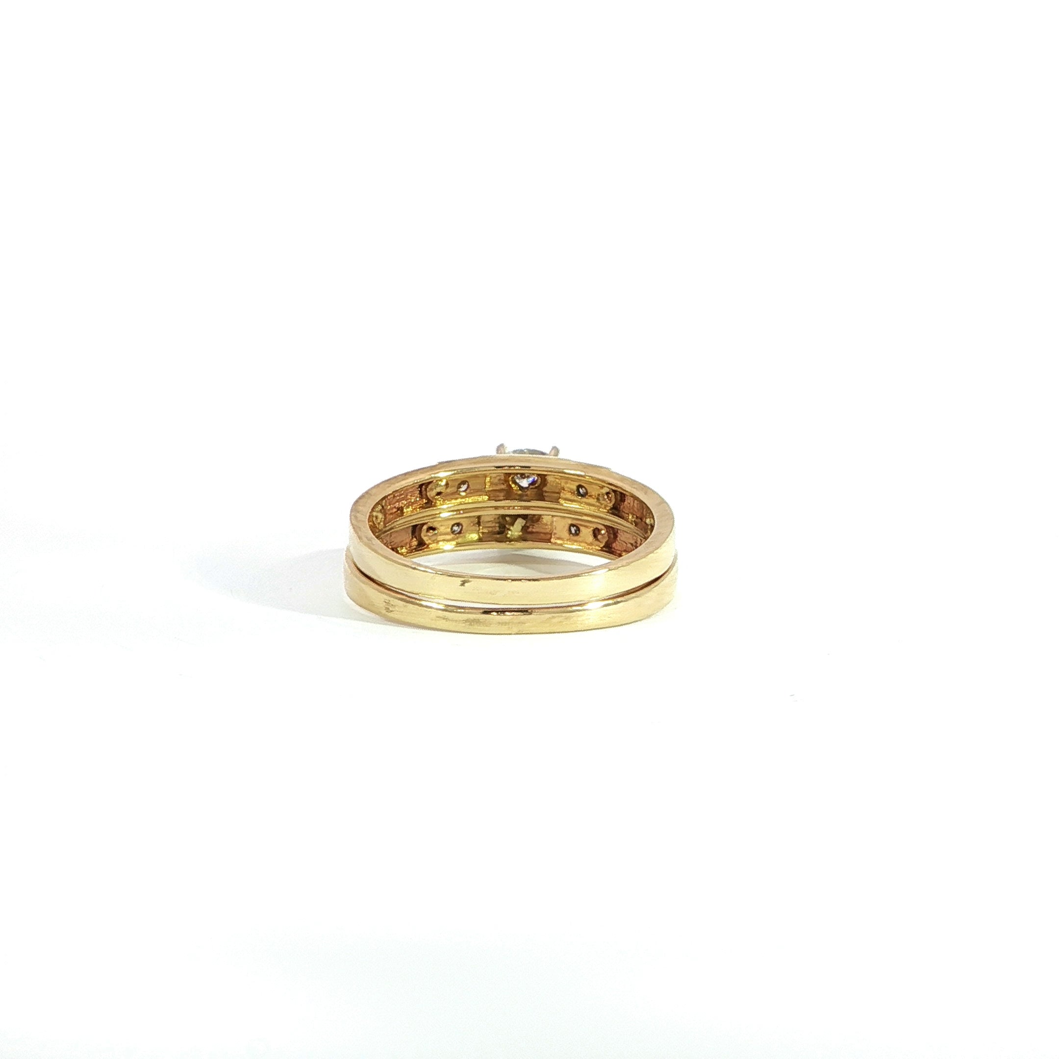Lab-grown round diamond bridal set featuring accent diamonds