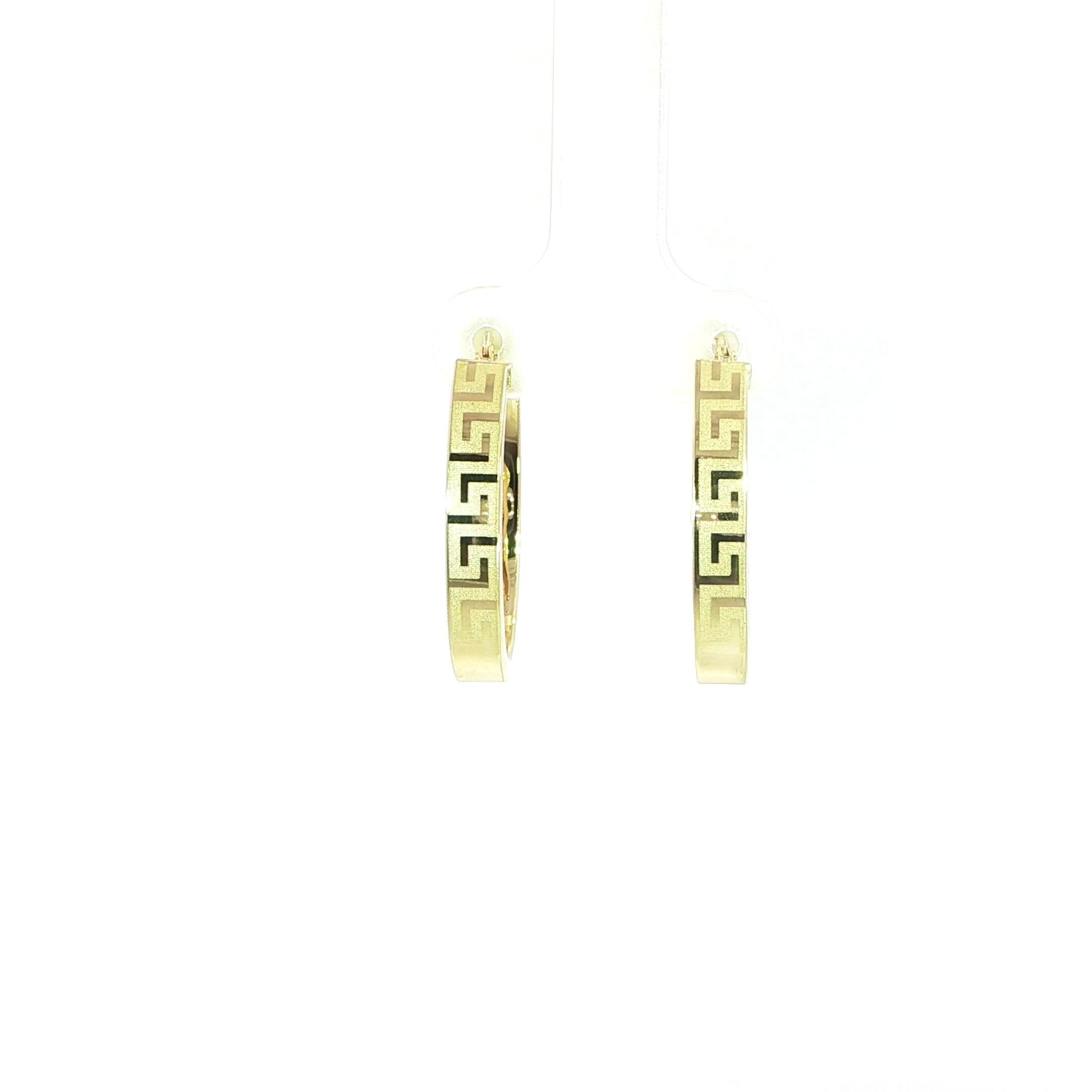 Elegant 21mm oval Greek Key hoop earrings in polished 10K gold.