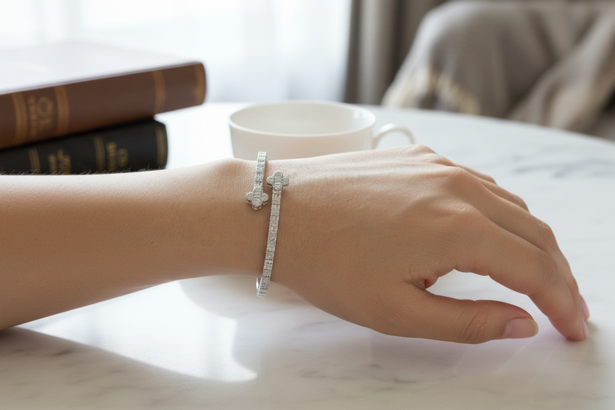 Designer-inspired sterling silver clover bangle with dazzling VVS moissanite stones
