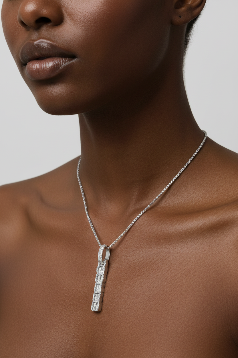 Vertical Queen pendant necklace with shimmering pave moissanite accents.