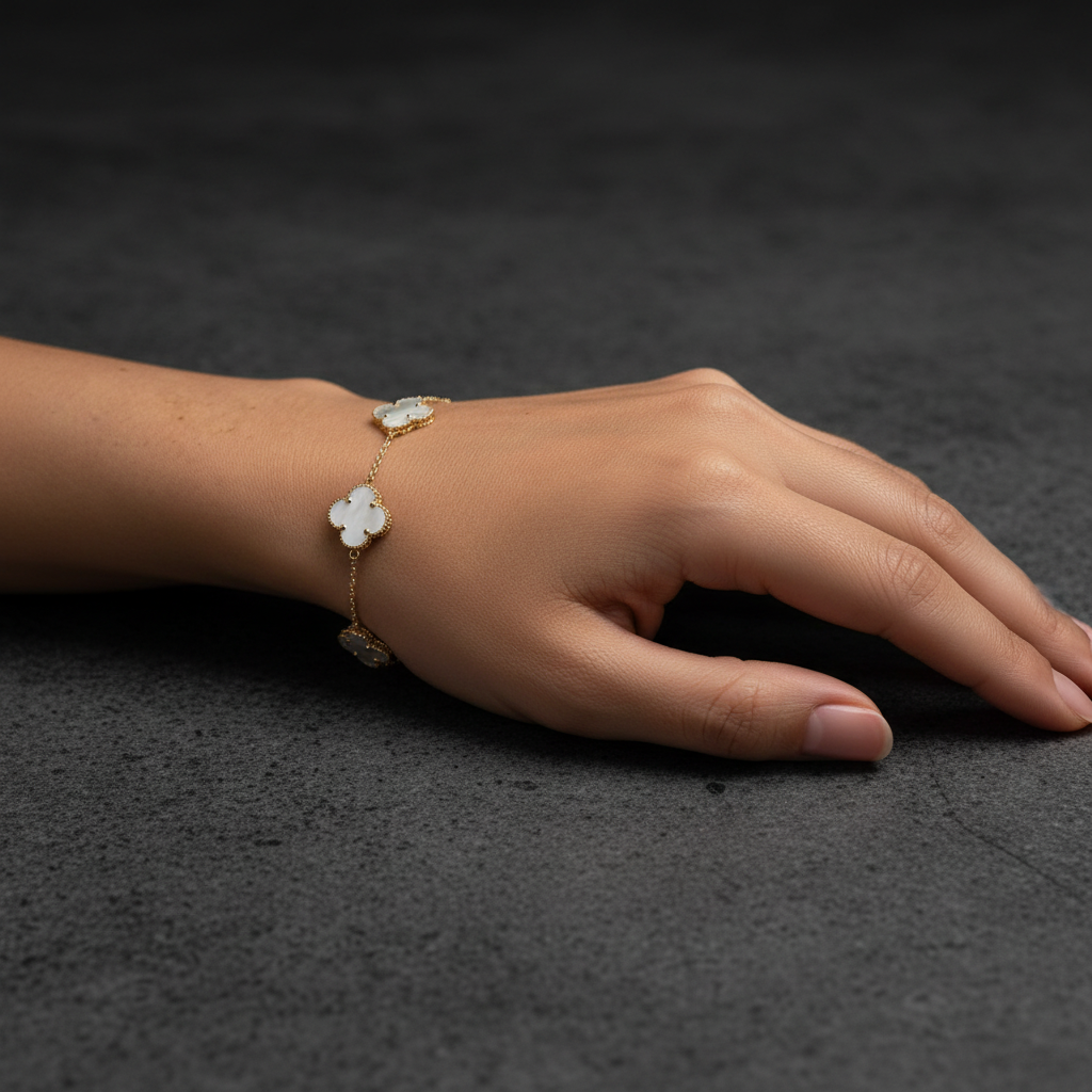 Women's 14K gold clover bracelet with luminous mother of pearl