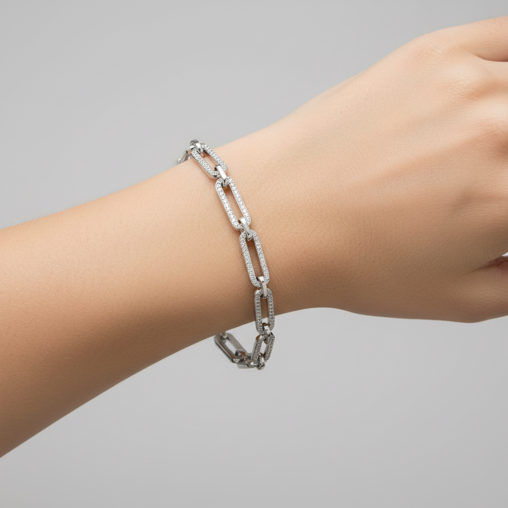 Elegant paperclip chain bracelet with pavé-set VVS moissanite stones.