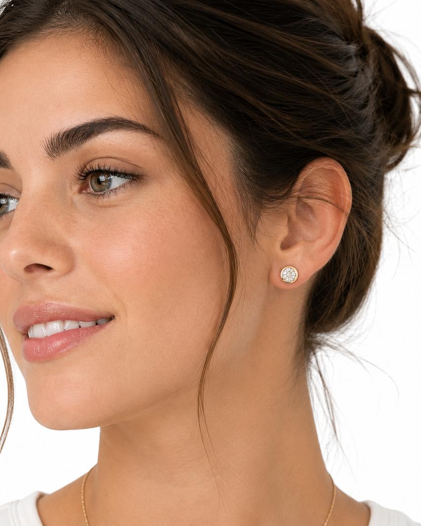 0.14 CTW natural diamond stud earrings in 10K yellow gold