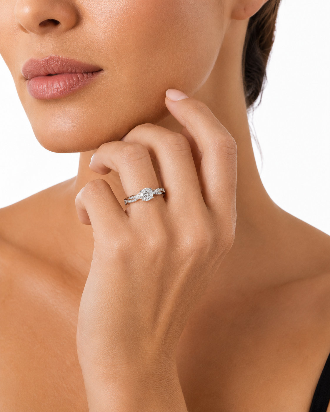 Round VVS moissanite solitaire ring with twisted sterling silver band