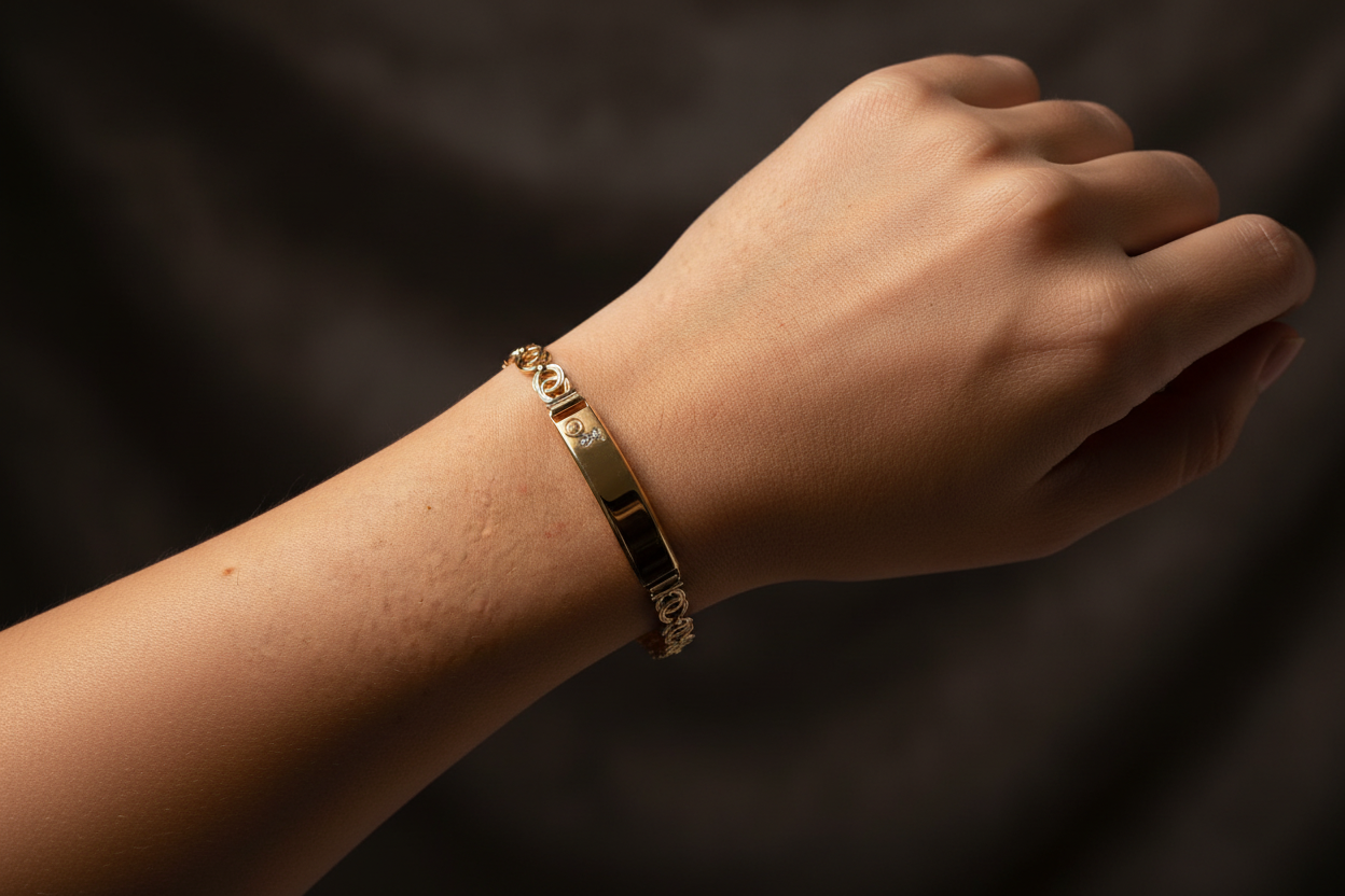 Women's 14K yellow white and rose gold ID bracelet featuring open circle links and rose detail