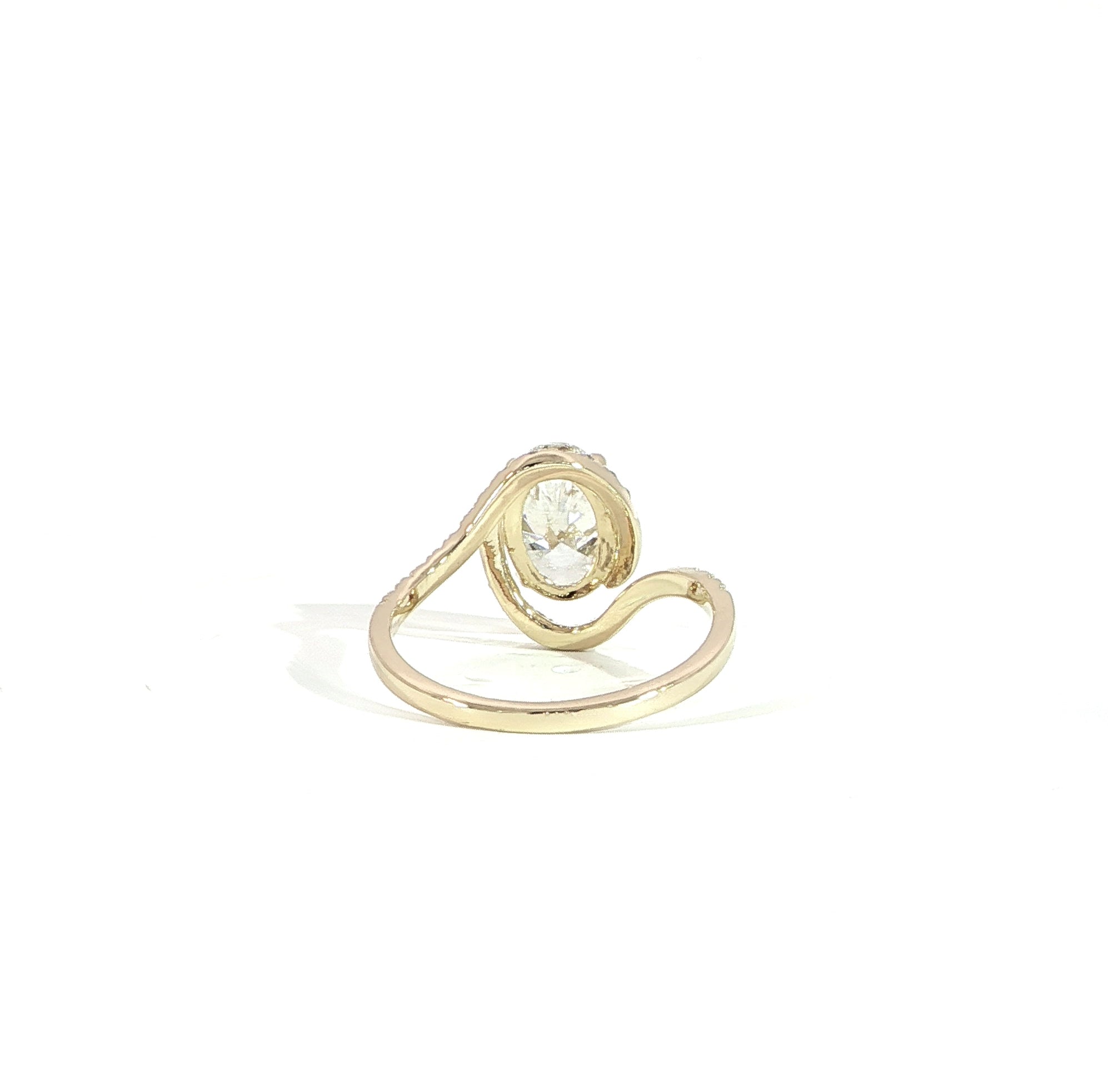 Back of yellow gold oval lab diamond halo engagement ring