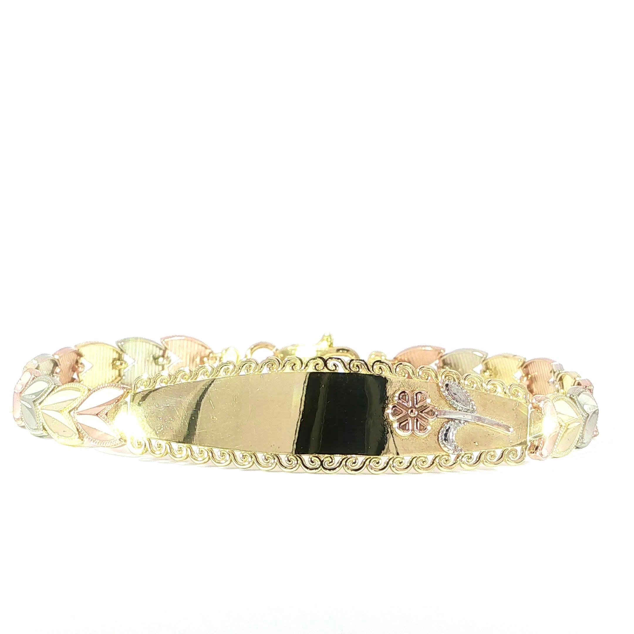 Video of tri-color gold ID bracelet featuring leaf-inspired links