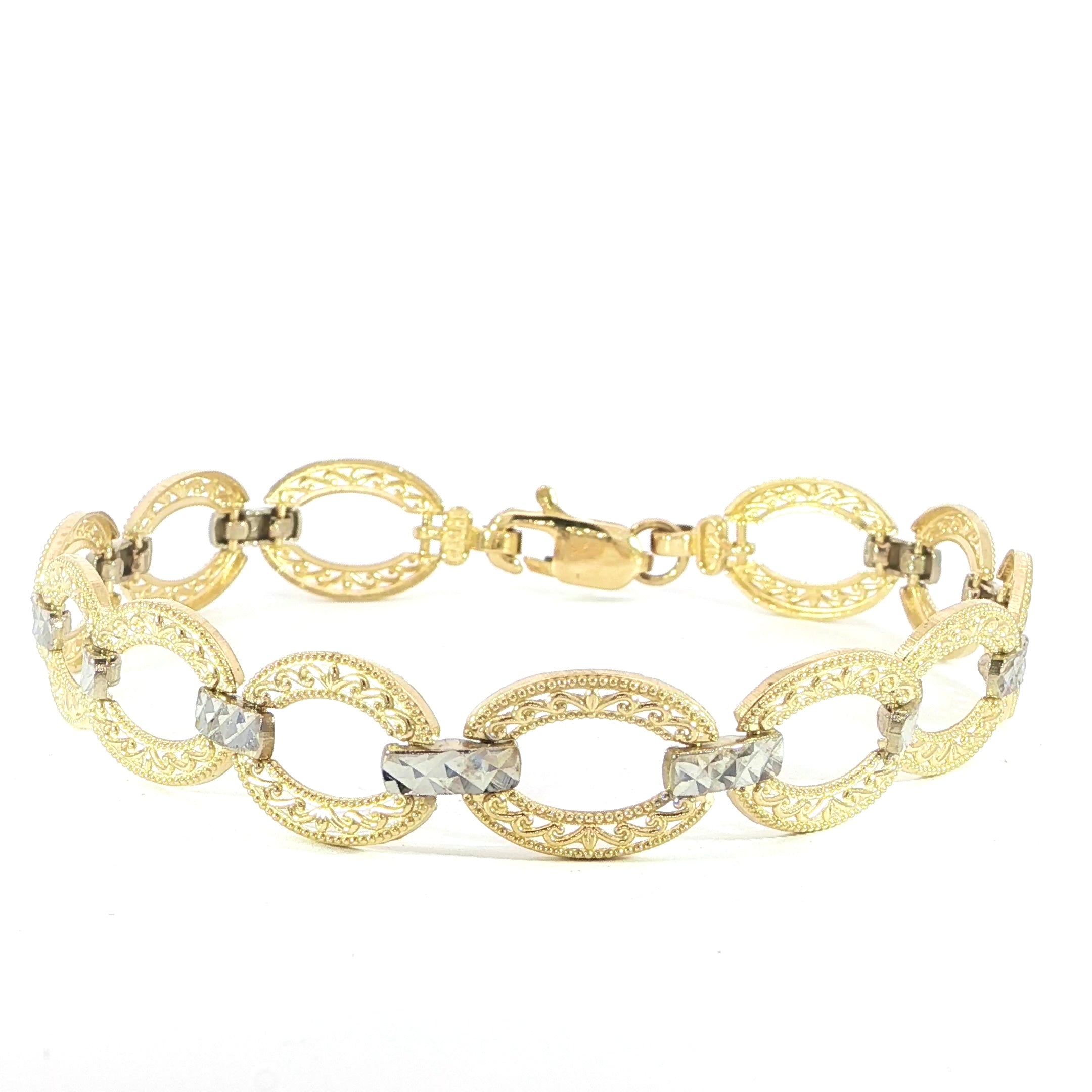 Video of vintage-inspired 14K yellow gold oval link bracelet with white gold details