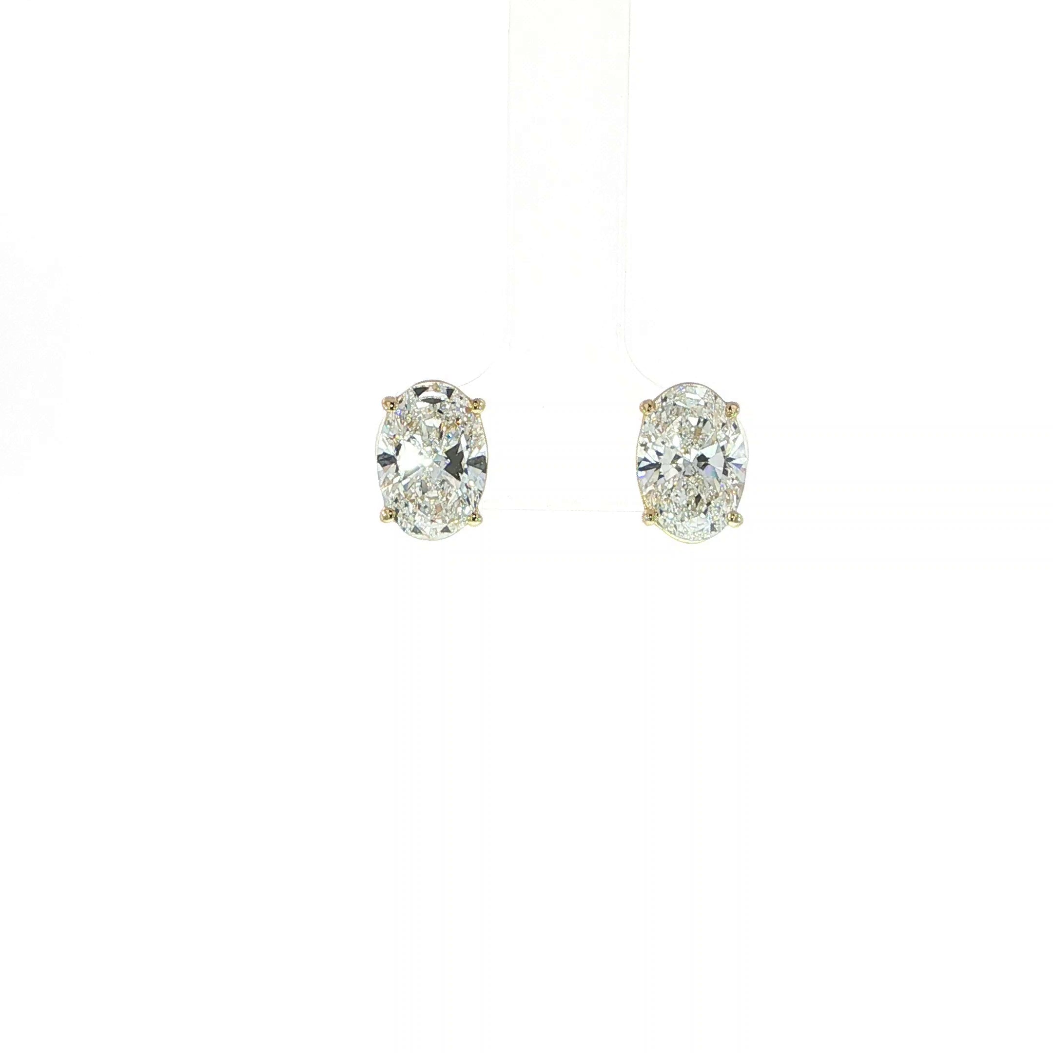Video of 4CTW Oval Shaped Diamond Earrings