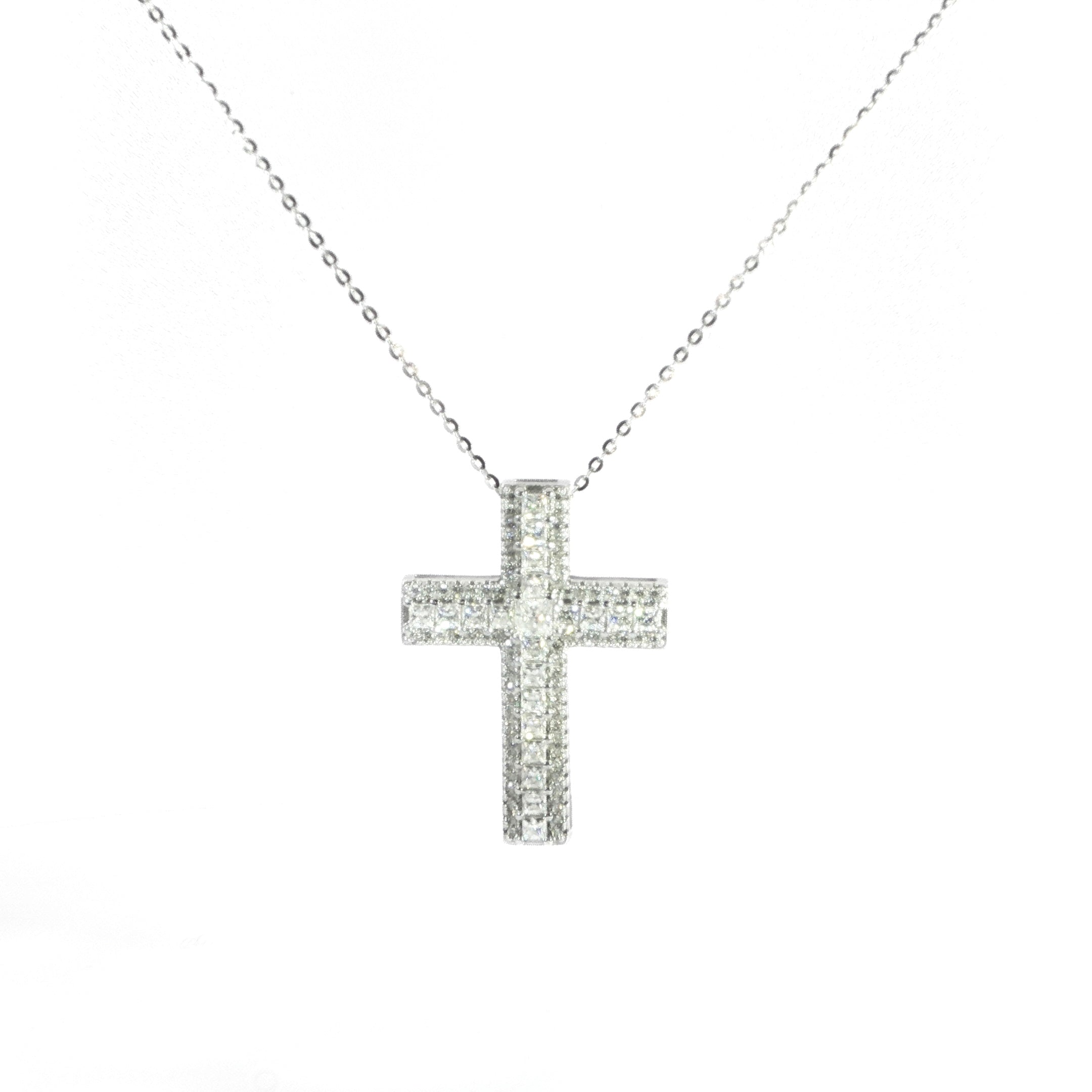 Classic sterling silver cross pendant accented with princess cut moissanite.
