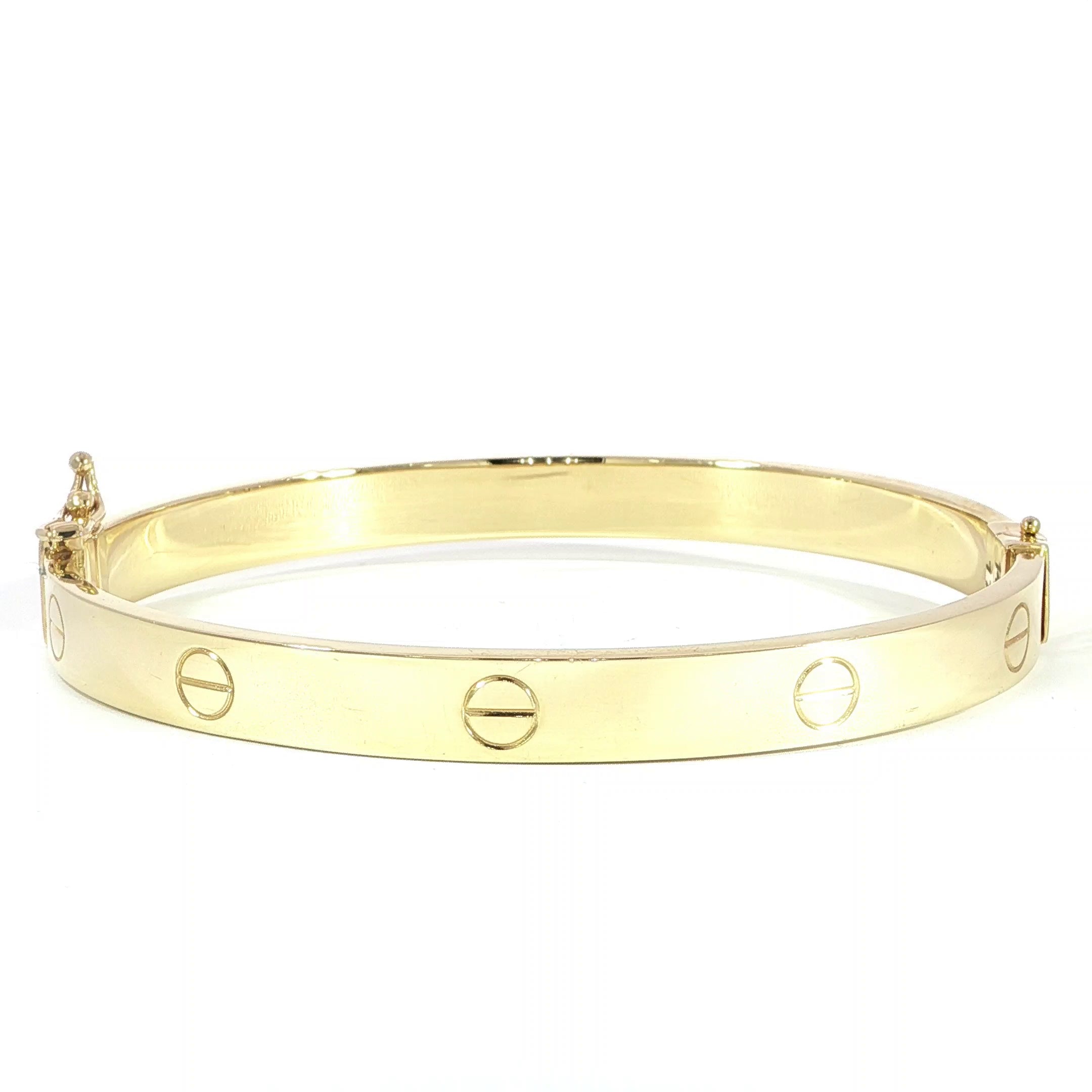 14K Yellow Gold Love Screw Inspired Brangle Bracelet.