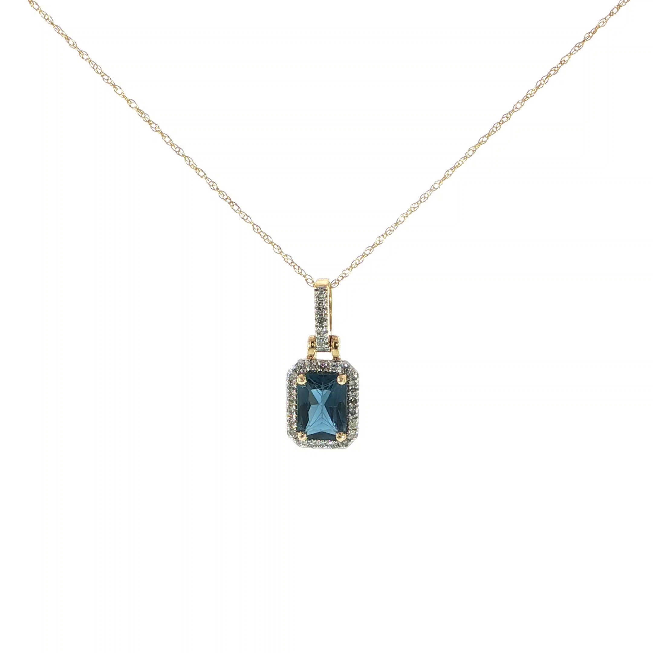 Elegant emerald-cut London Blue Topaz pendant surrounded by natural diamonds.
