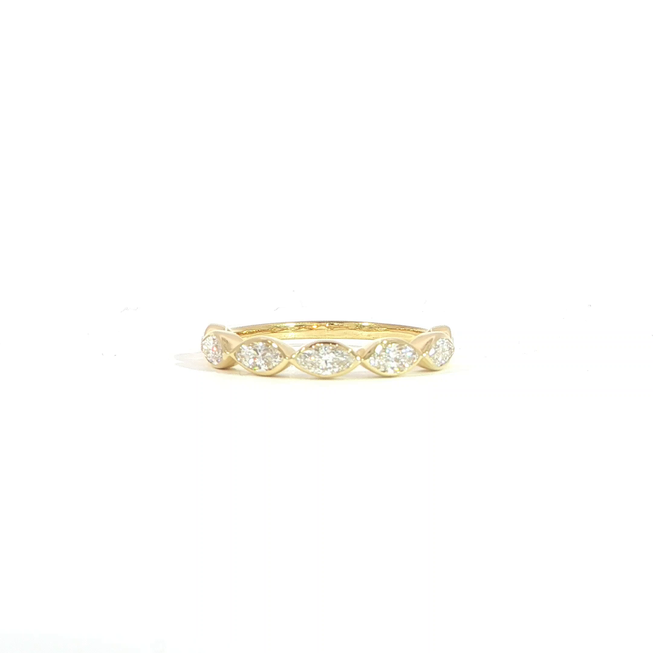 Close-up video of marquise diamonds in bezel setting