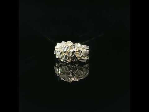 14K yellow gold wide diamond-cut nugget ring displayed against a glossy black background, showcasing its bold 13mm textured top and polished gold finish.